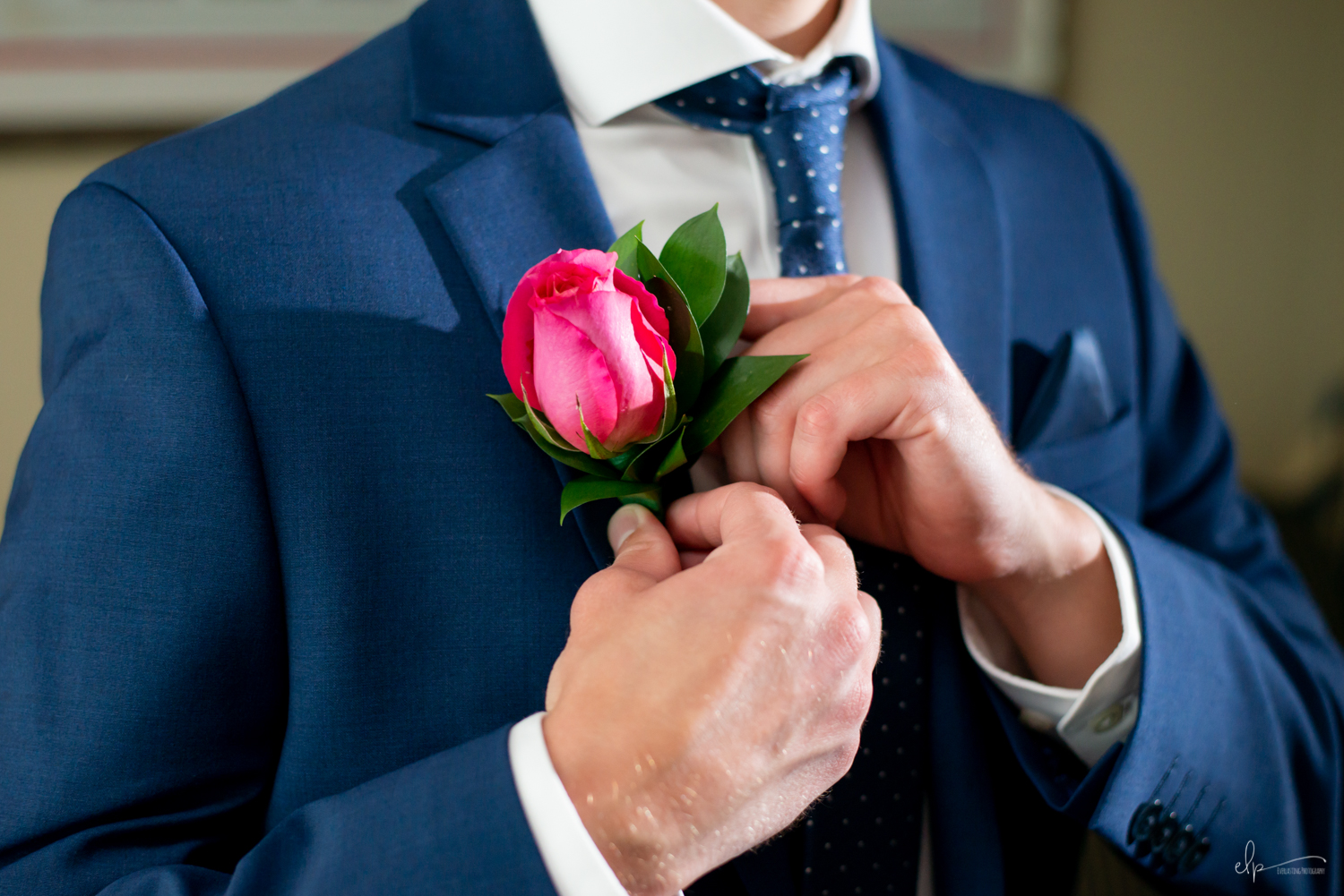 Groom getting ready wedding photos on disney cruise line
