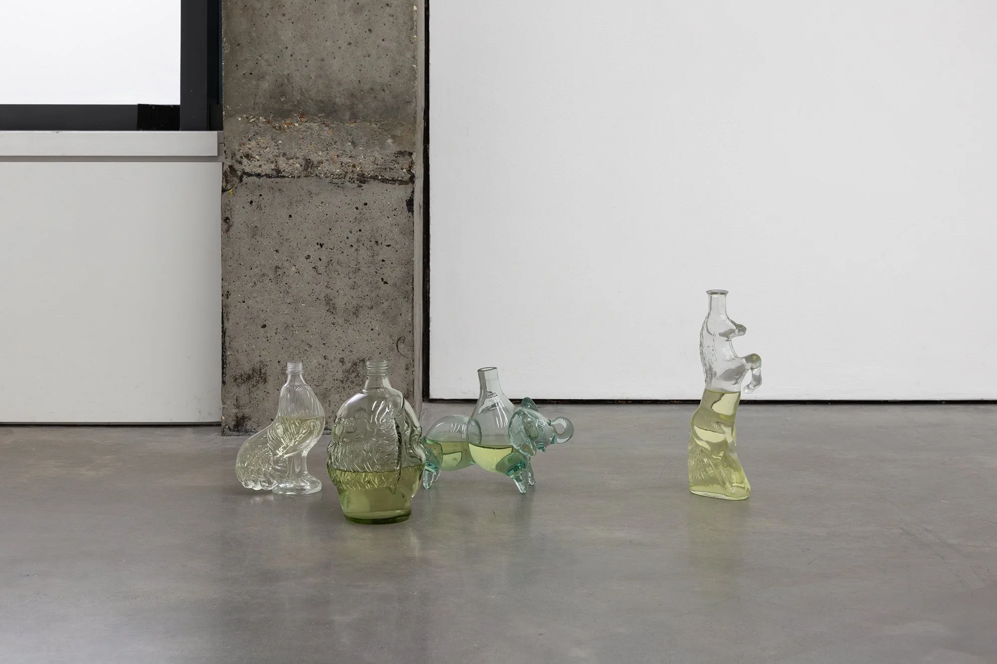   Untitled (Day Anatomy)&nbsp;    Gold dissolved from plated wristwatches, leeching agent, water, glass. Dimensions variable  (detail)  