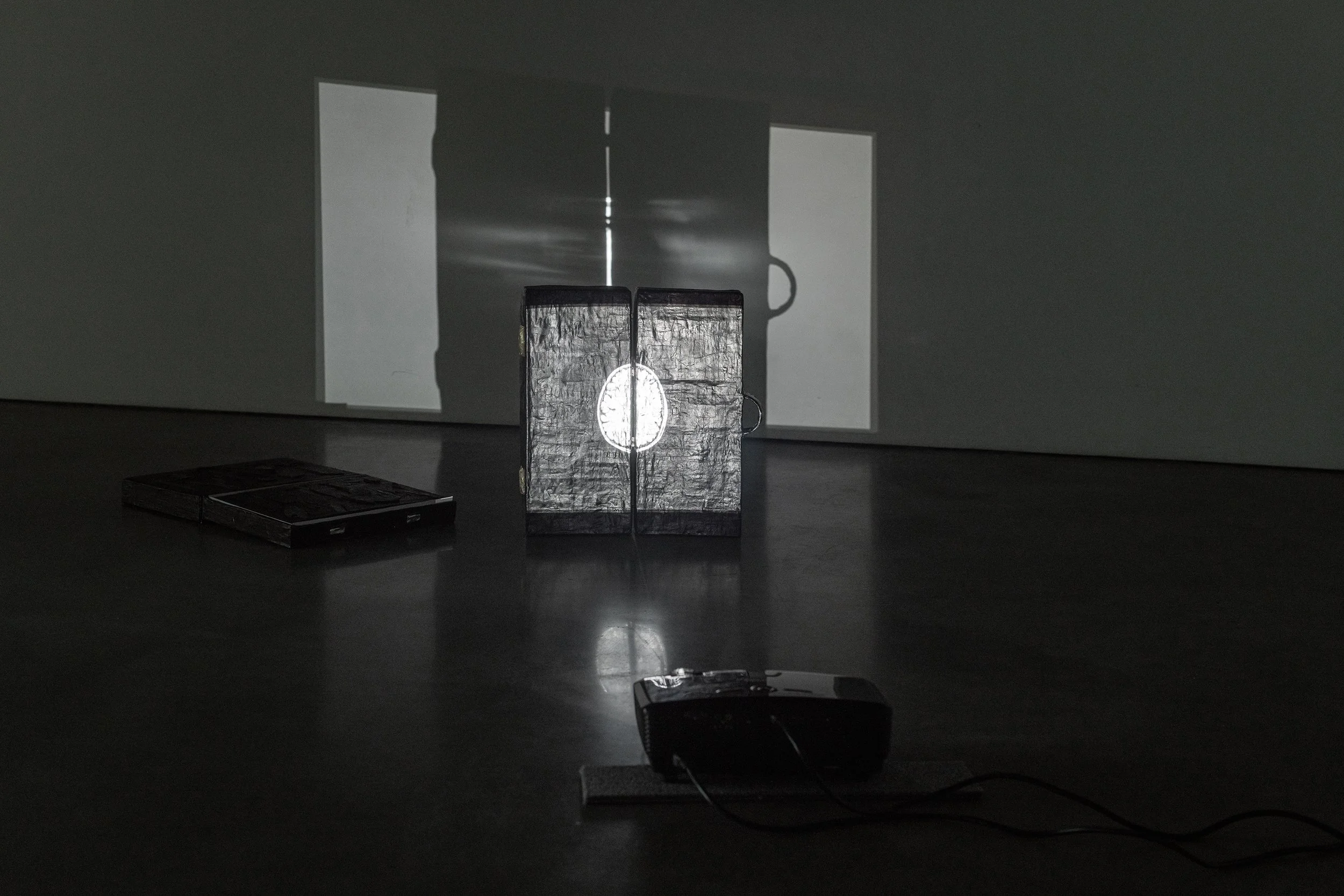   Empty Box   Papier-mache, foam, paint, hinges, silent frame-by-frame animation, 2 clay olive leaf burners by Charlotte Mellis  Dimensions variable  2.32’ looping&nbsp;  2026‍      ‍ 