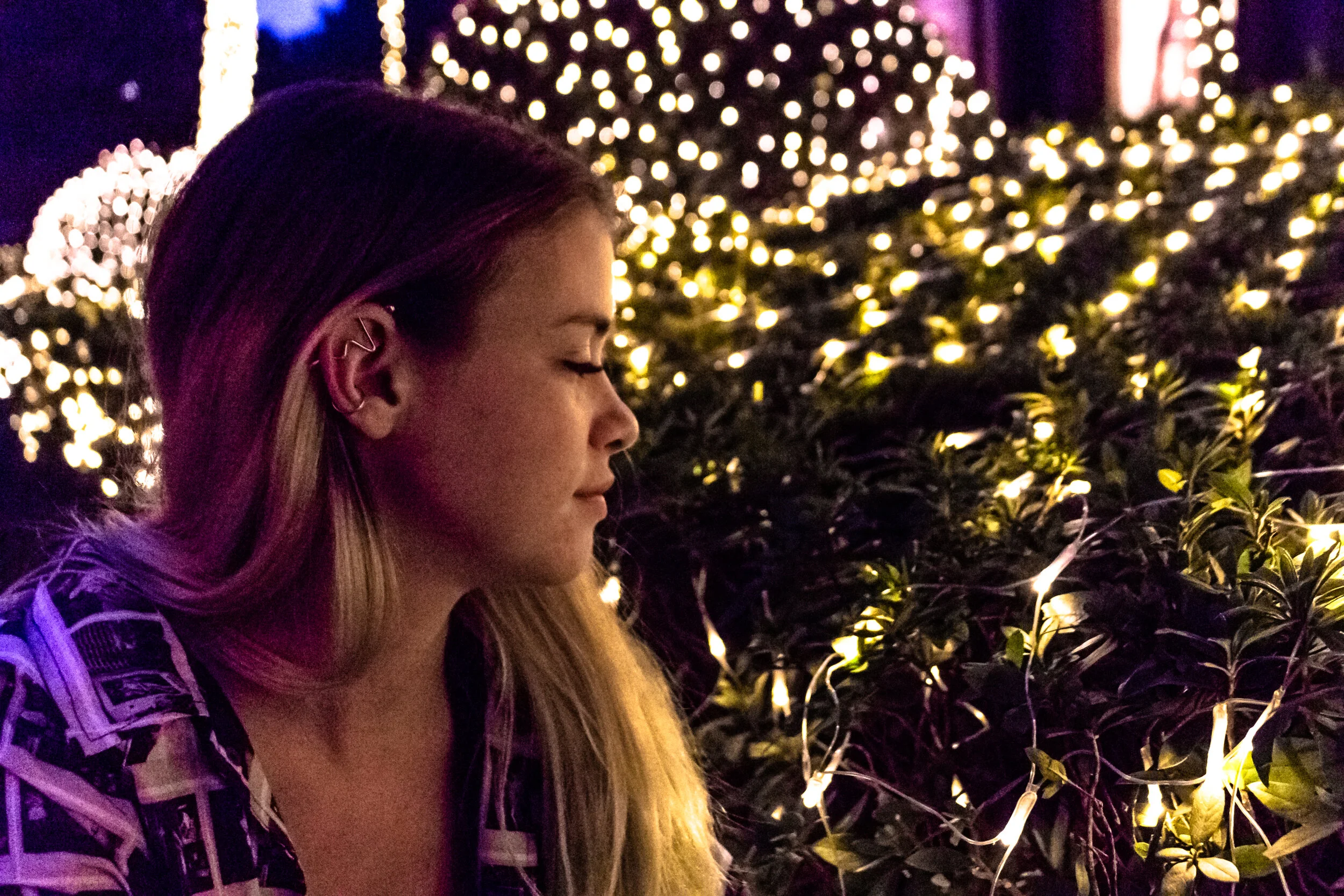 Girl Facing Christmas Lights.jpg