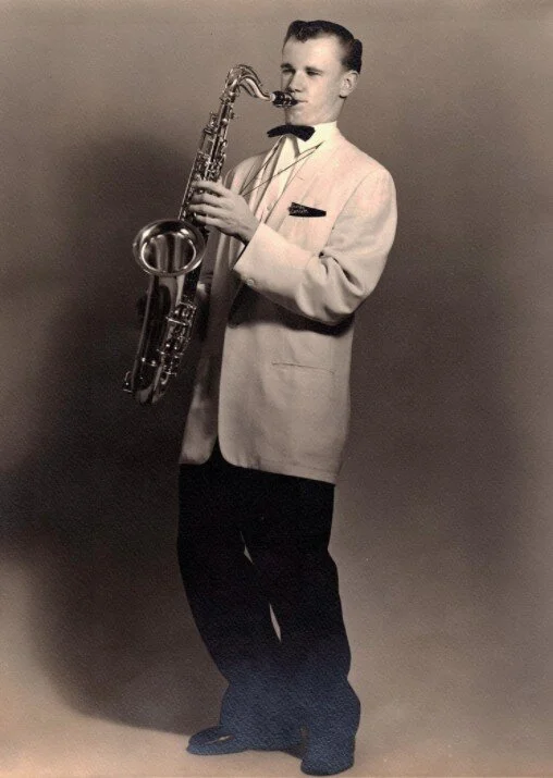 ‘Burke, age 18, with his tenor sax and a white dinner jacket he used to buy by the dozens in order to keep everyone suited up.’