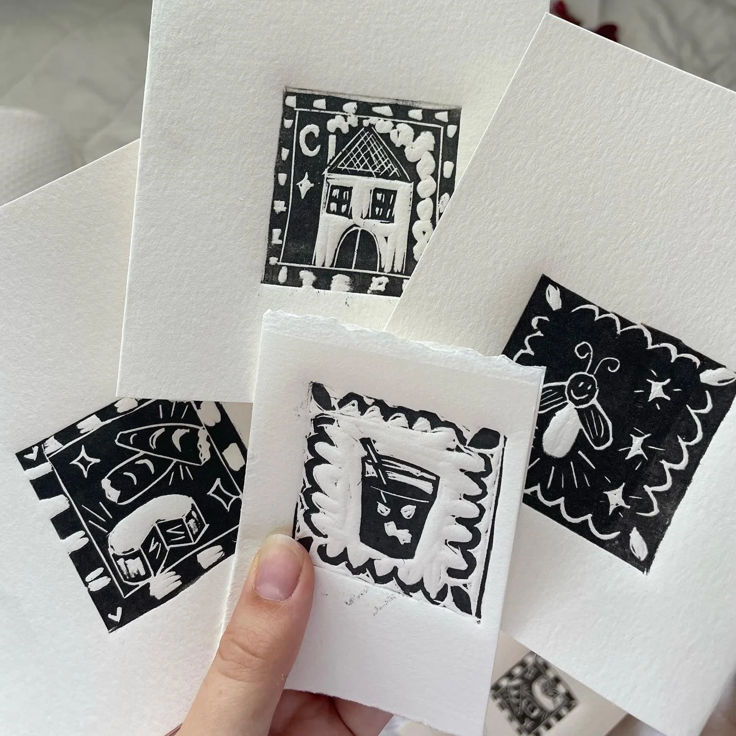 printed a bunch of little cards &amp; bookmarks with stamps I carved in @sophie.printmaking &lsquo;s class! they all represent an aspect of home to me🏠💛 swipe to see me really excited about using the press @visartsrva