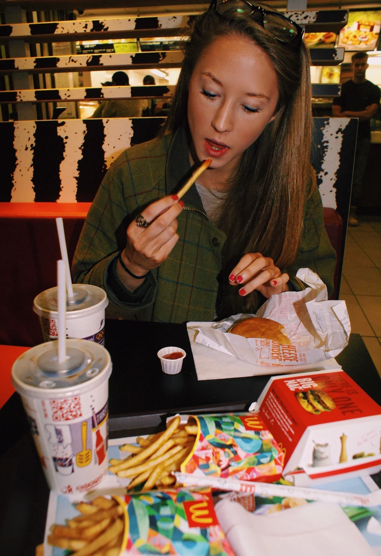 Me guzzling a McDonalds on holiday in 2014, again before anorexia appeared
