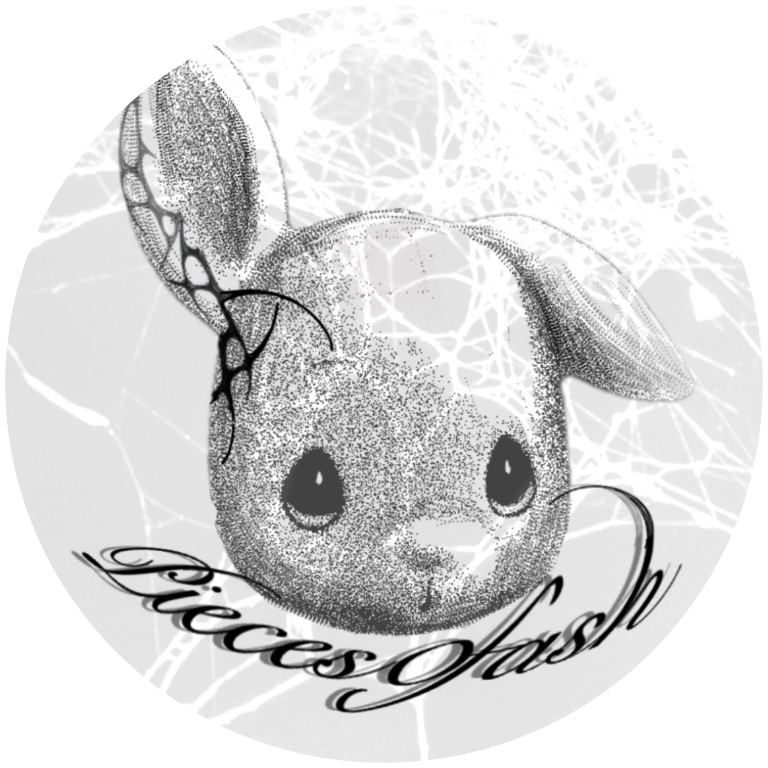 A rabbit's cute head in black-in-white over the words "Pieces of Ash."
