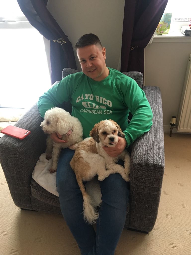  Steven at home with Scruffy and Luna 