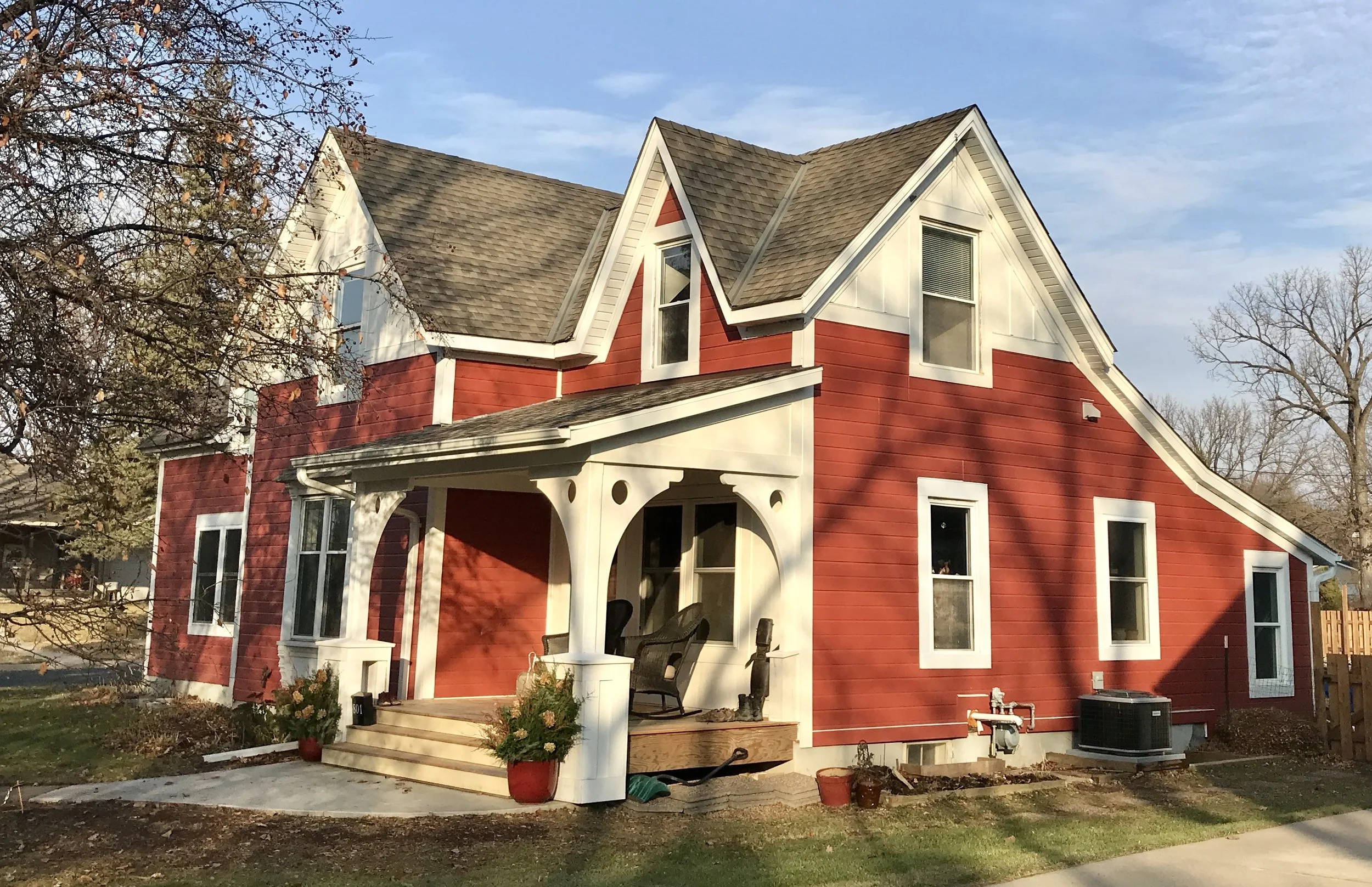 The New porch and siding provides a welcoming entrance