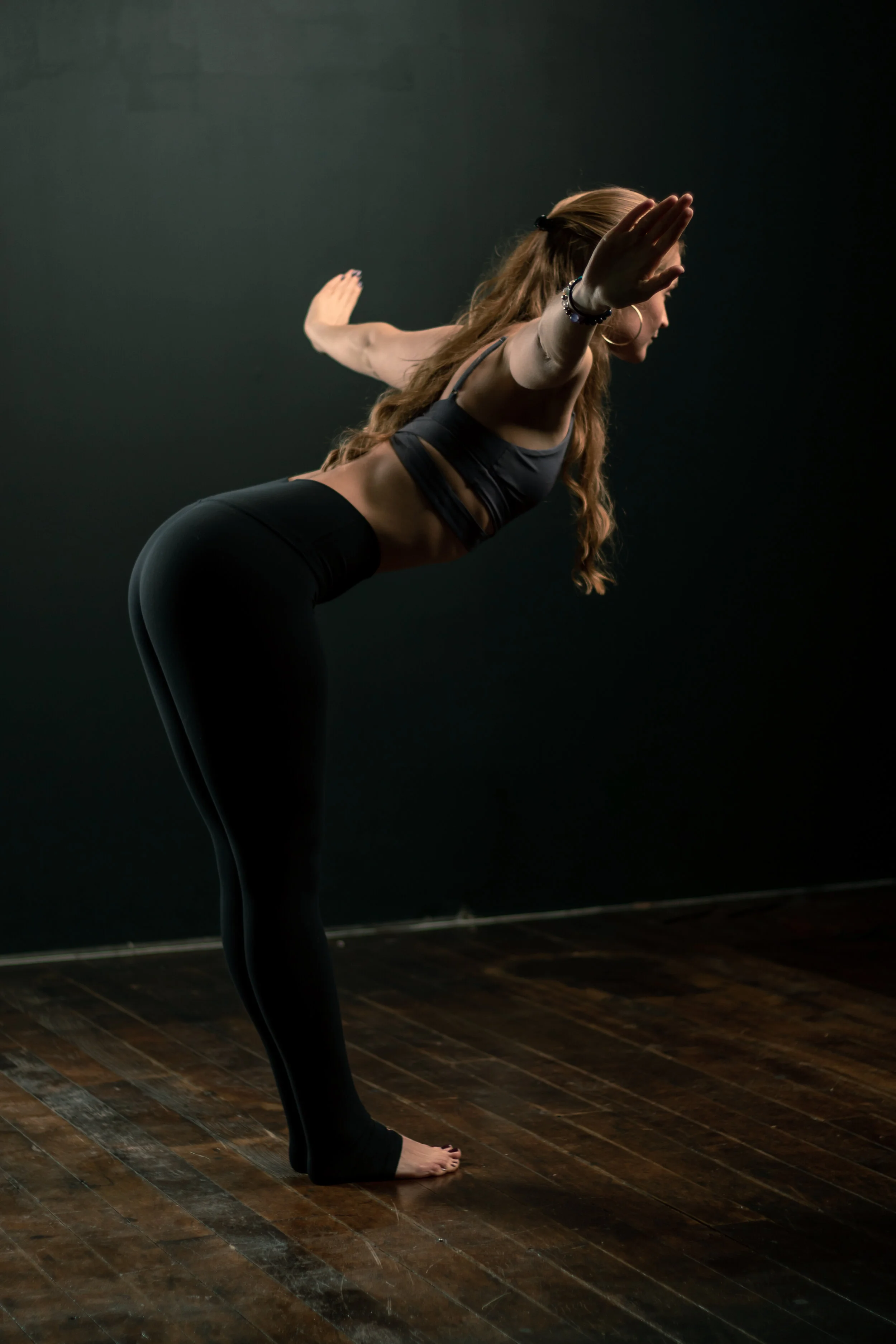 Justine in transition into forward fold (Copy)