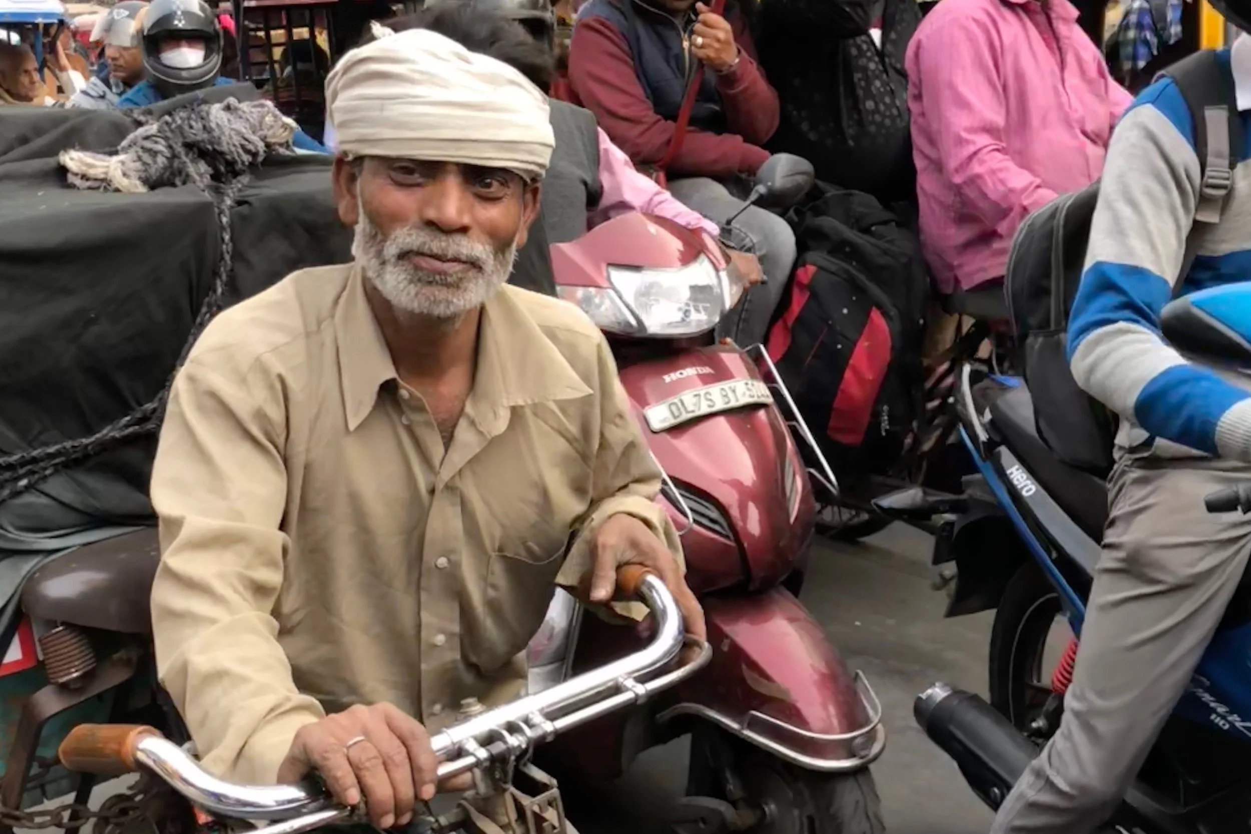 I took this photo, with my subject's permission, while sitting in a traffic jam in Old Delhi, December 2017.