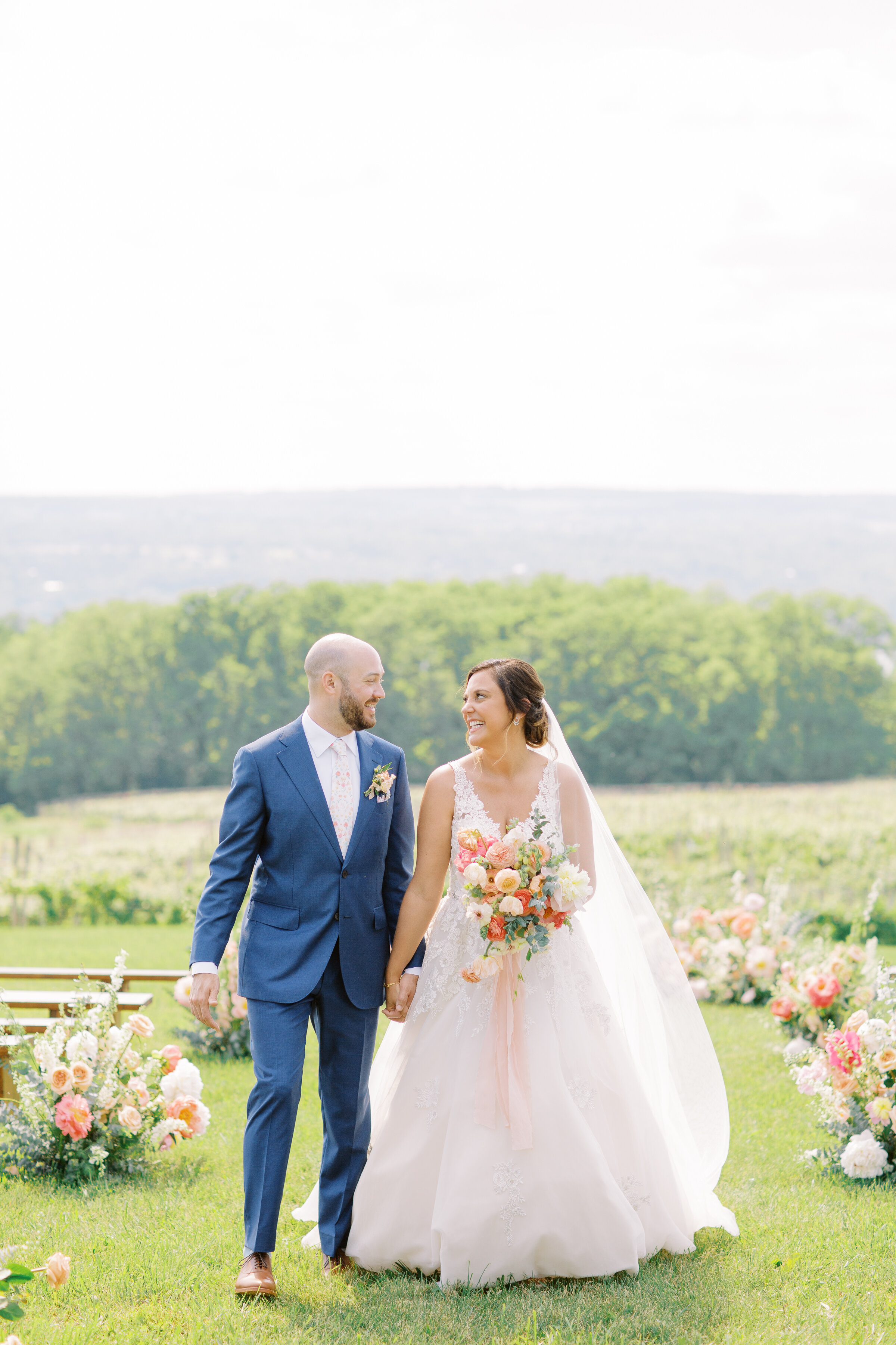 bride-navy-suit-groom-colorful-floral-stone-fruit-wedding-stationery-fingerlakes-alexandra-elise-photography