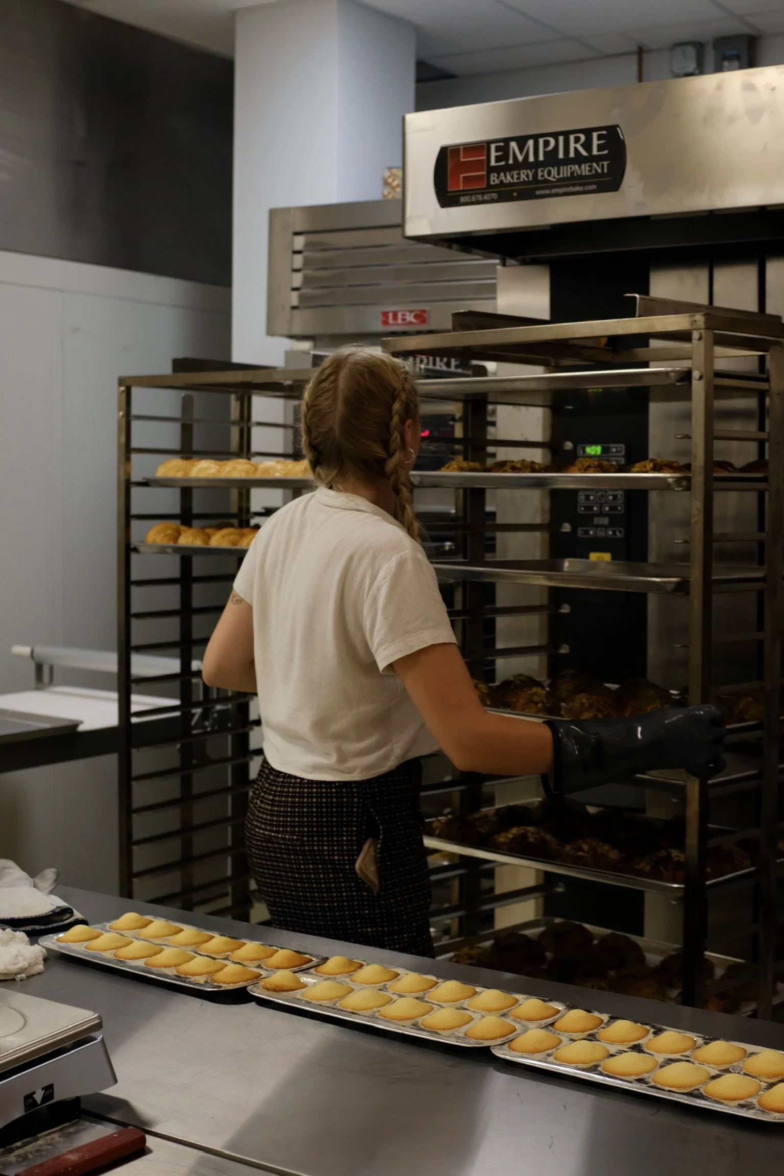 Baker preparing pastries at Elephantine Bakery and Café in Boston Fort Point