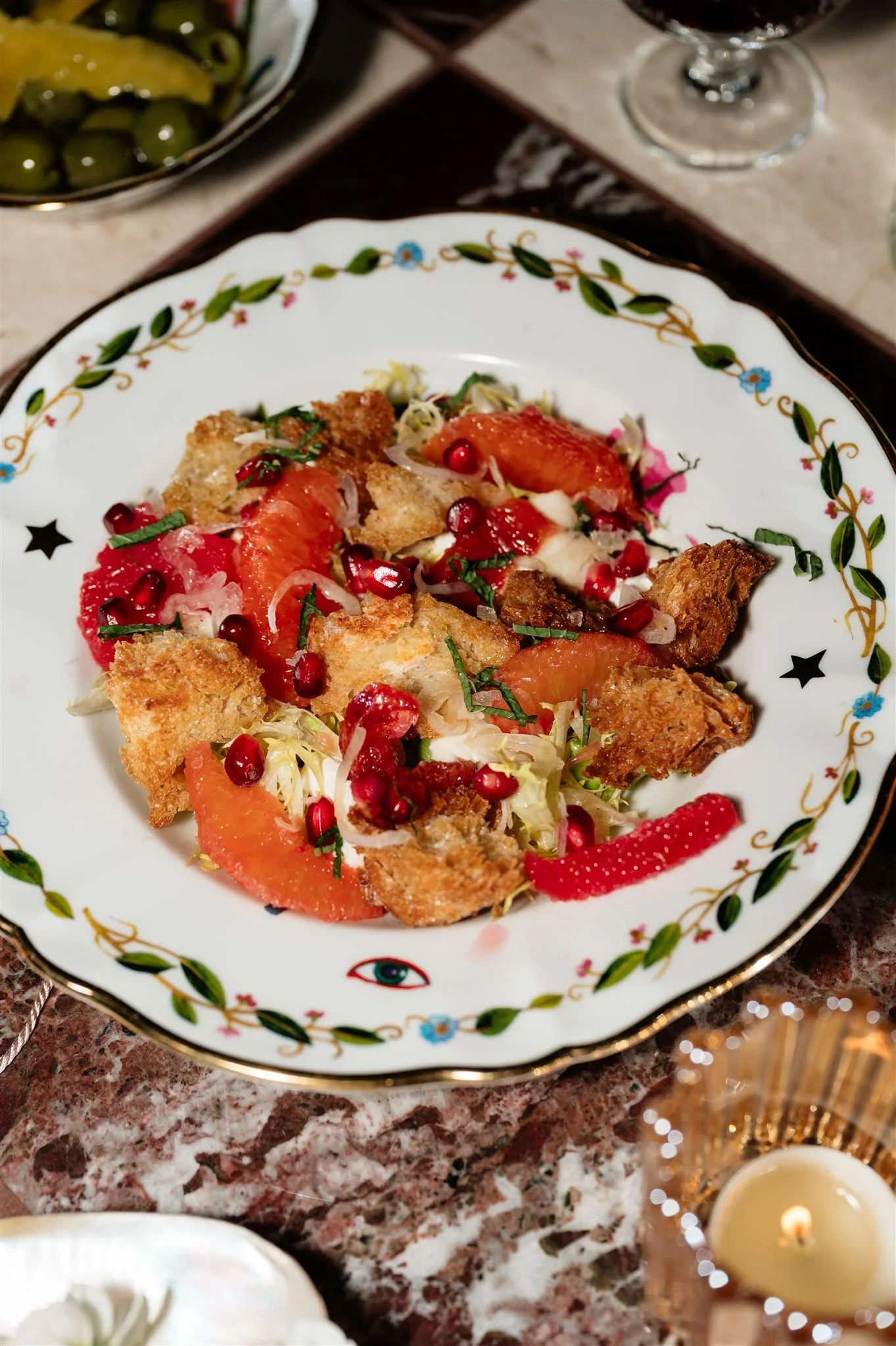 Citrus burrata salad served during aperitivo at Elephantine Bakery in Boston’s Fort Point