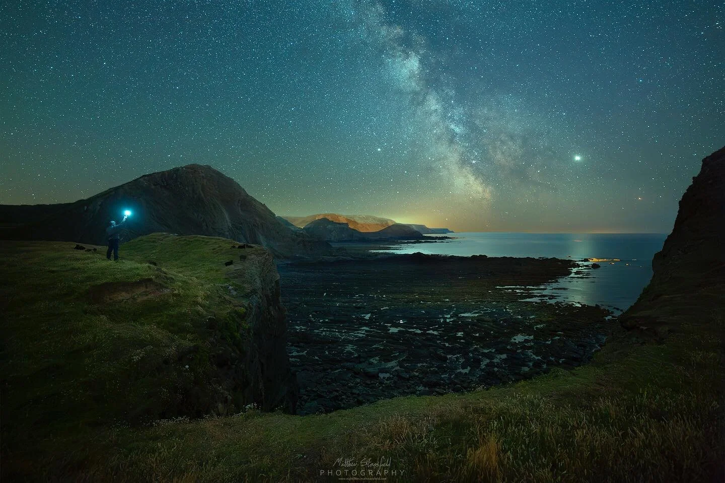Hartland Quay- Devon
Web: www.nightskies.mattstansfield.com

Story: I took this image back in 2019 and initially dismissed it because it was noisy. However, with the DeNoise software progressing constantly, I opted to revisit the edit.

It is interes