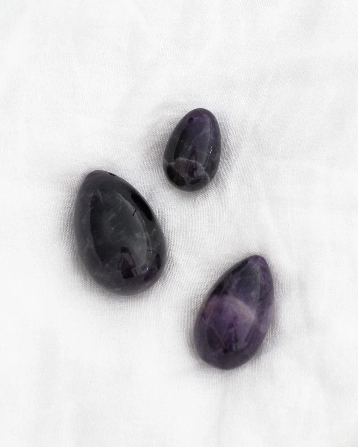 Amethyst Yoni Egg &bull; Intuition &bull; It radiates a calm and soothing energy that quiets your thoughts and enhances your focus, perception and intuition. #lucidmoons