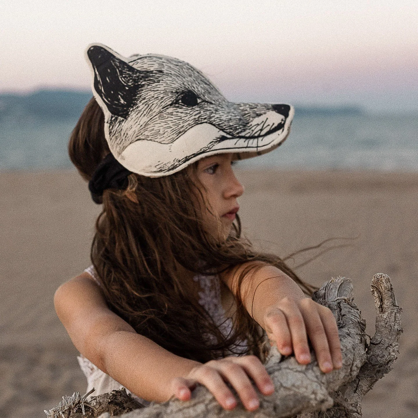 Cream Fox, printed on organic cotton and lined with handloom check cotton &mdash; a cosy companion for winter adventures where ever you are.