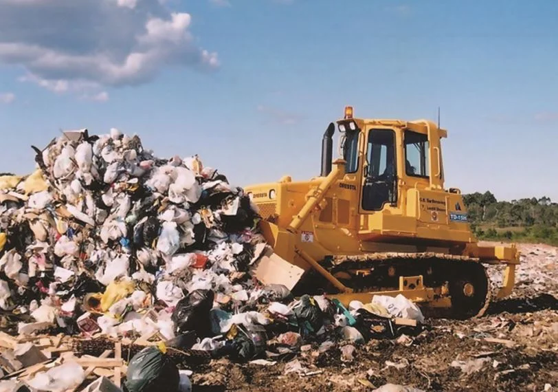 land compactor and waste.JPG