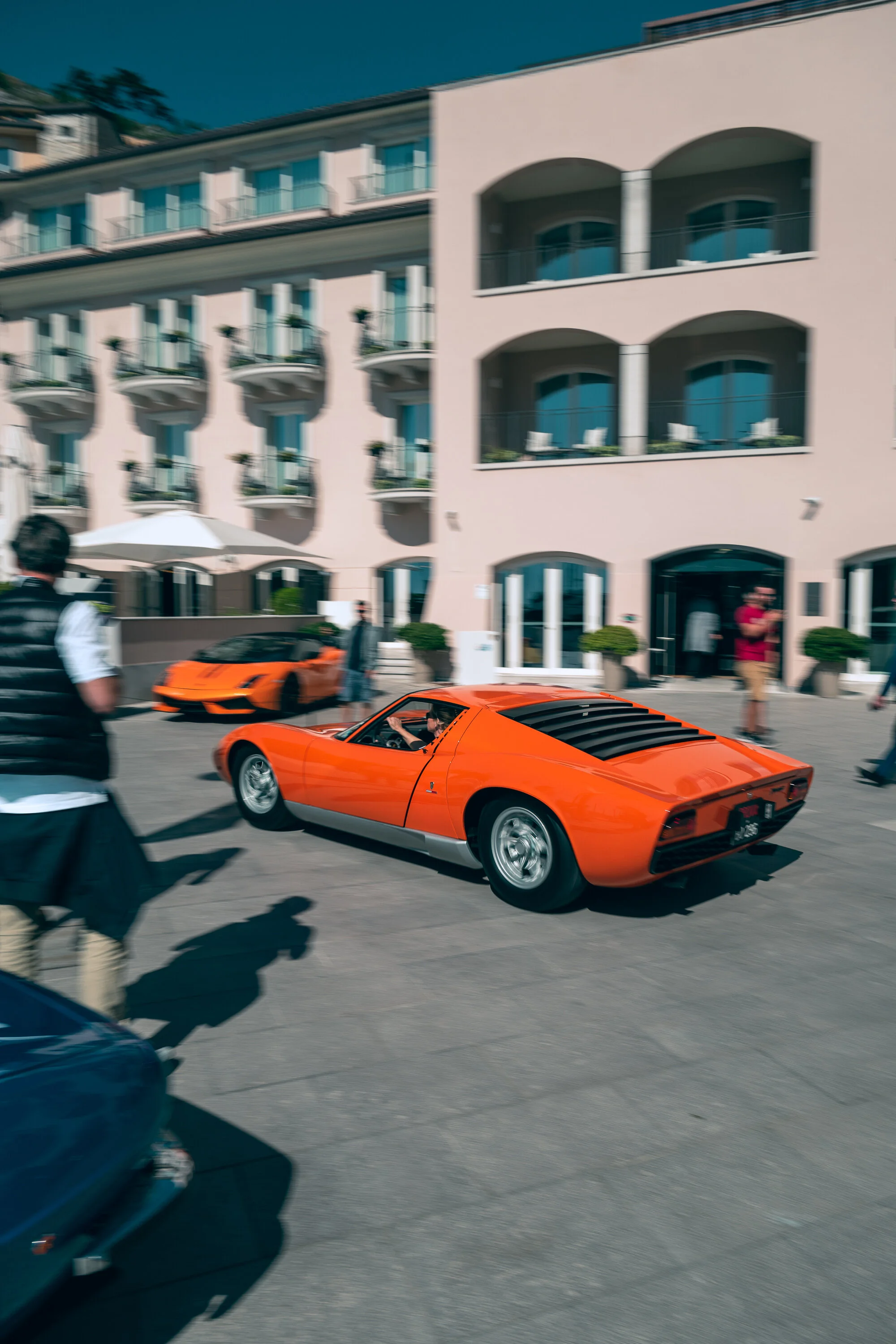 Lamborghini Miura accelerates in front of Falisia Resort.