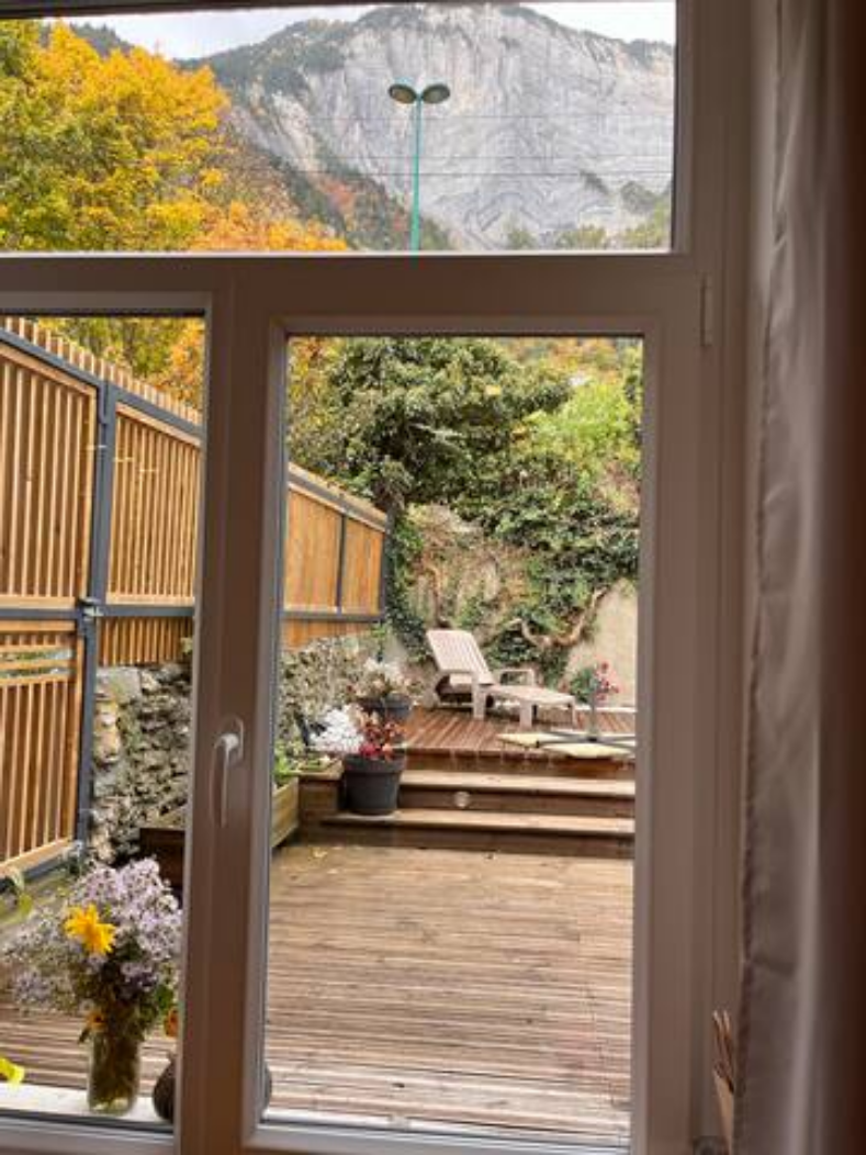 Kitchen window with view of decking.png