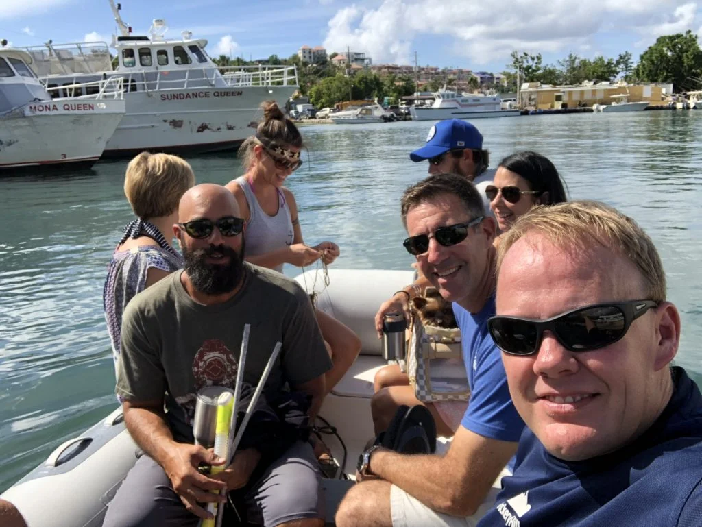 dinghy out to Soulshine catamaran in Cruz Bay