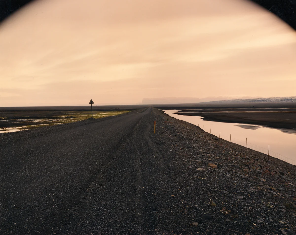 Ring road as it passes between the Black Sand Desert and the glacier-covered volcano Katla, Myrdalssandur, Iceland, 1987