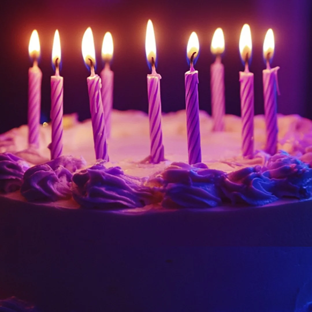 “Friends celebrating a birthday party with cocktails before a live comedy show.”