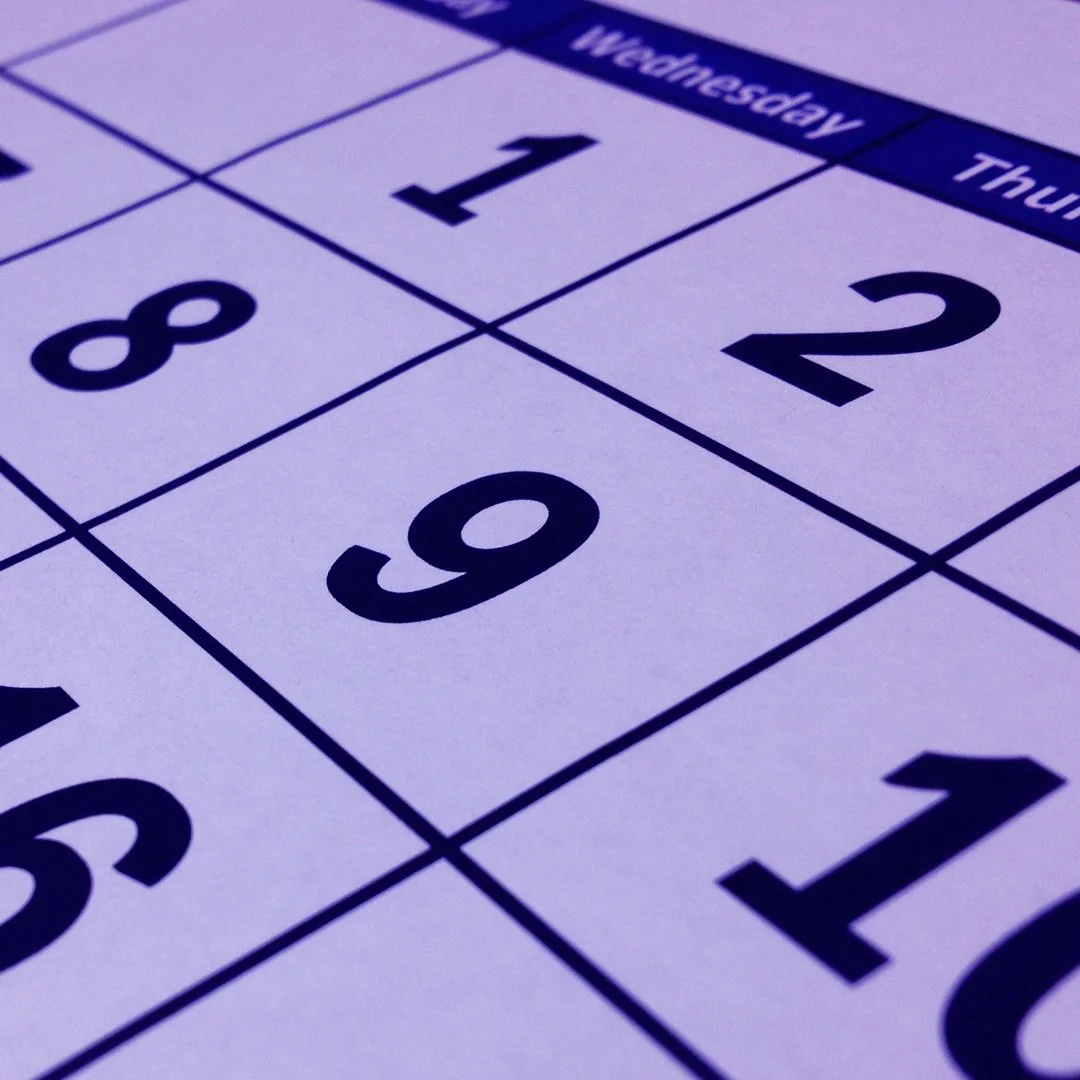 A couple celebrating an anniversary date night at a live stand-up comedy show.