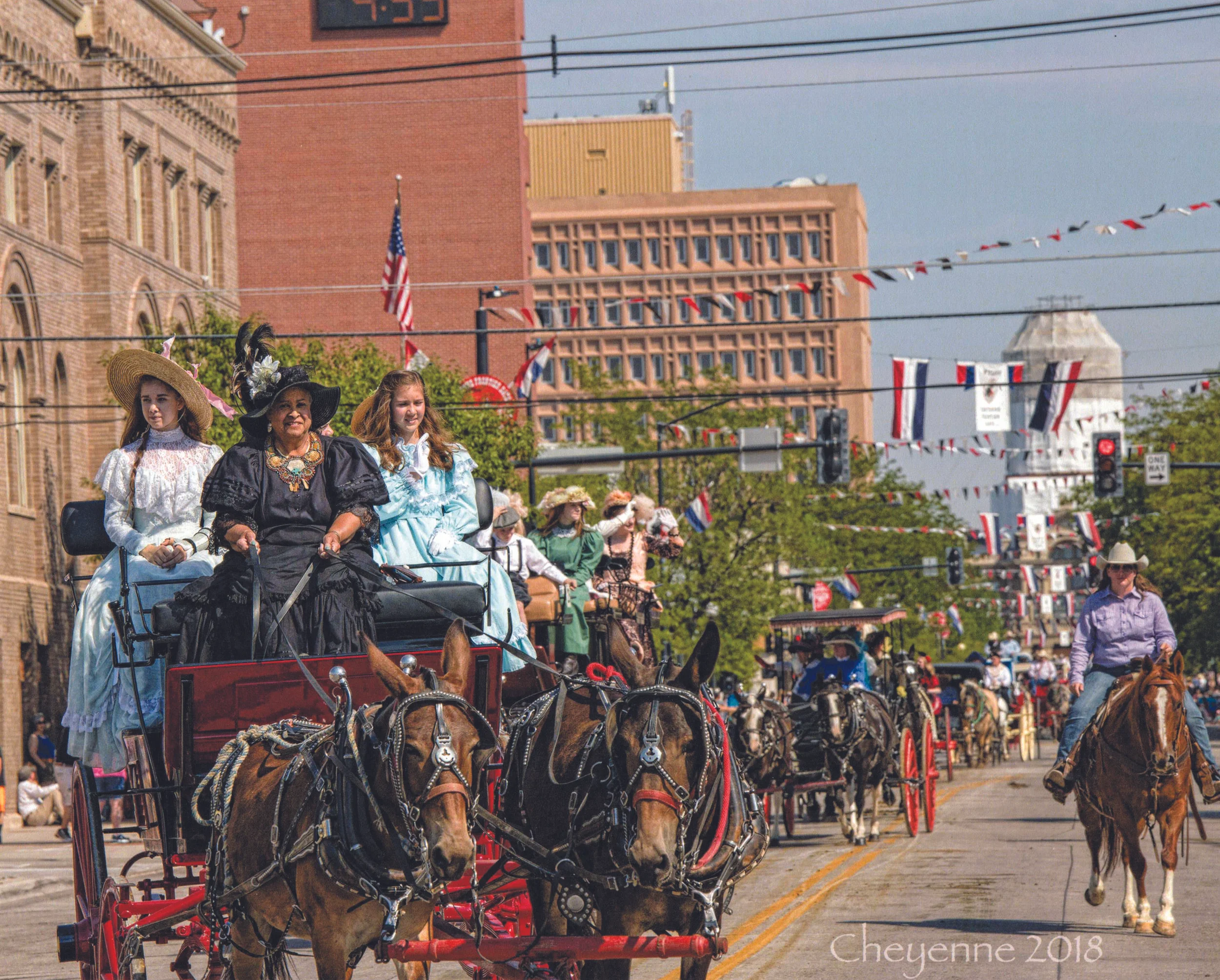 YOLANDA STROUP with her team, Dixie and Jake, during the 2018 Grand Parade. Photo by Sissy Schneiderman