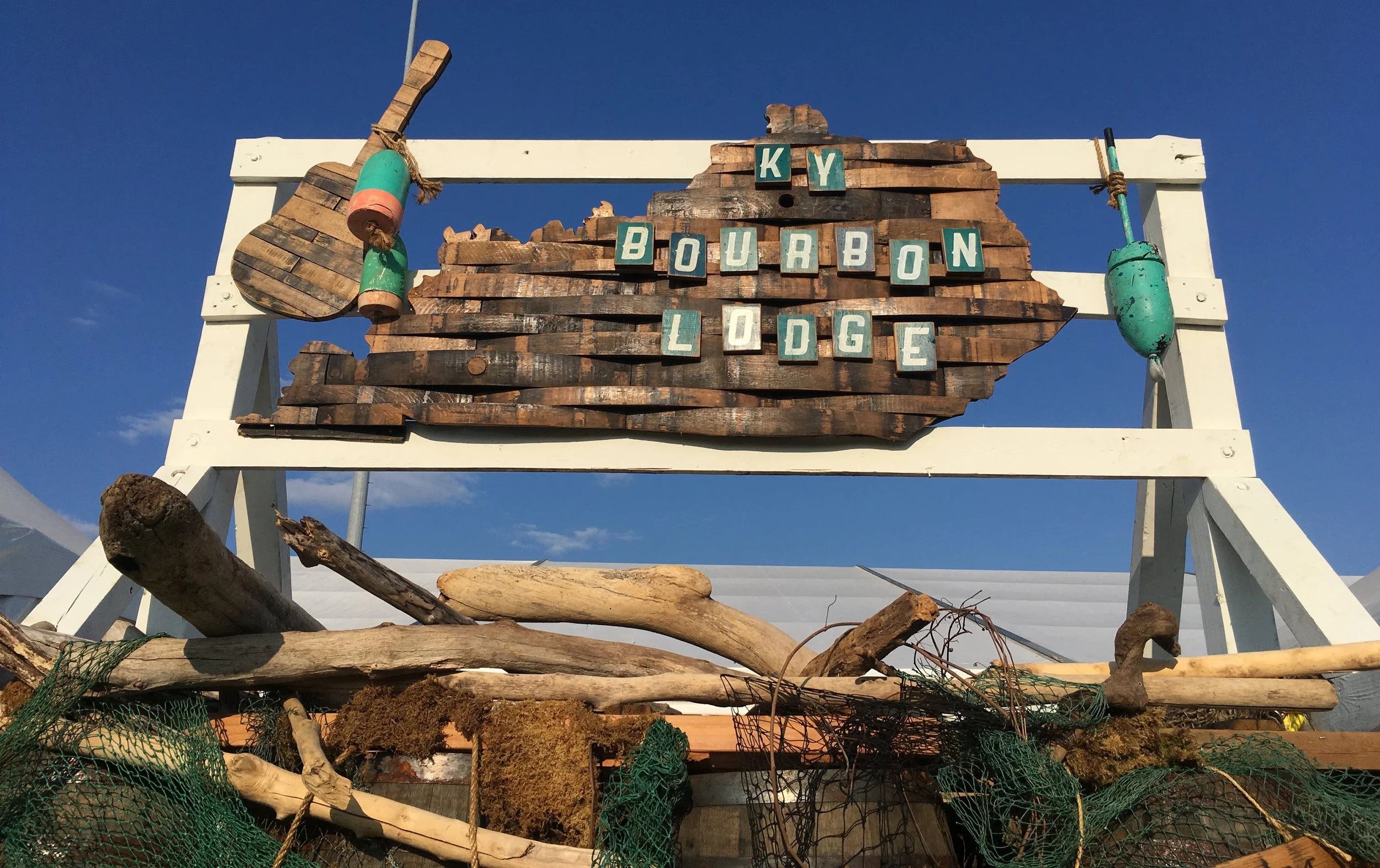 Lead Visual Designer of Forecastle Bourbon Lodge for AC Entertainment, 2012 to 2018: Stephanie Lindsay; Sign Maker: Bourbon Barrel Rehab; Lettering: State Champs.
