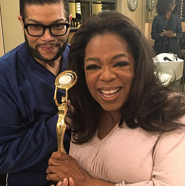 Derrick Rutledge Recipient of the Hollywood Beauty Award is congratulated by his client OPRAH WINFREY