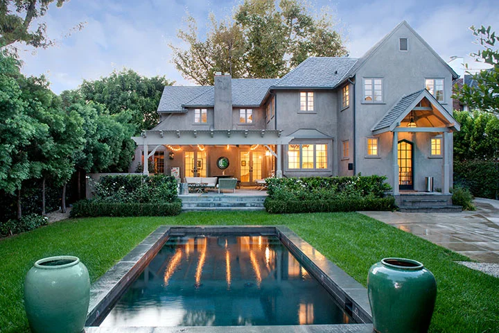 1614 Fairfax Ave | Los Angeles SOLD! $2,880,000 Warm, welcoming Traditional situated on a spacious 8,400 sq. foot lot in Los Angeles' highly coveted Sunset Square neighborhood. This European-inspired home's sophisticated 3-bed, 5-bath layout is comprised a first level with elegant eat-in kitchen, dining room, lounge/breakfast area, laundry room, media room (or additional bedroom) and living room with beautiful original features. The second level features 2 large guest bedrooms with full baths and an elegant master suite with high ceilings, walk-in closet and a luxurious master bath. The private, fully-hedged backyard is lushly landscaped with an outdoor dining level, BBQ area, sparkling pool and 2-car garage large enough to be easily converted into a guesthouse. All mere minutes from some of Los Angeles' best hiking, shopping and restaurants.