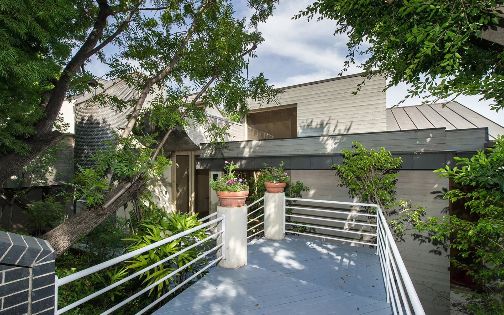9610 Oak Pass Road | Beverly Hills SOLD! $5,900,000 (Sold Twice) Fantastic Architectural Home on Oak Pass Road! Stunning Marshal Lewis designed home on one of the most coveted streets in LA. Open floor plan with soaring ceilings and walls of glass. All public rooms look out to majestic canyon views. Sited on 3.8 acres. Light and bright living room with hardwood floors and fireplace. Large dining room, movie theater and gym. Great master suite with dual walk-in closets. Resort-like living with manicured gardens and pool. 3-car garage. Extremely private. Located on one of the few gated streets in the city. Beautiful living!