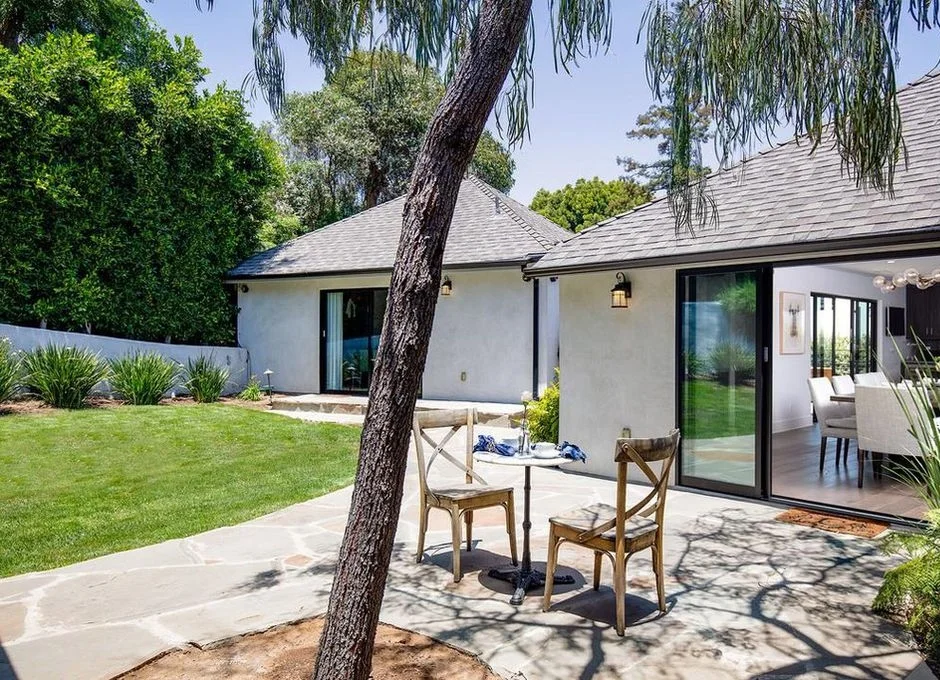 2841 Montcalm Ave | Hollywood Hills SOLD! $4,225,000 This private luxurious compound in the Hollywood Hills offers a first class experience of true California living. Sunlight, crisp glass doors & wide panel floors throughout create a feeling of grounded peace & tranquility. Perfect for entertaining, the home includes a 480 bottle wine cellar, a saltwater pool, an embedded indoor/outdoor professional grade sound system & a private gymnasium. Lush grounds for dining al fresco, basking by the fire pit & taking in views stretching from the Hollywood sign & Observatory to the S.F. Valley & San Gabriel Mountains. Inside, a spectacular home theatre features a 12 ft. wide screen, Dolby Atmos sound system, Italian suede fabric theater walls & complete soundproofing on the ceiling, walls & floors. The home is completely secure including 25 HD night vision cameras & a dedicated space for security. There is also a detached guest house / pool house with a full bath and kitchenette. This is an absolute must see!