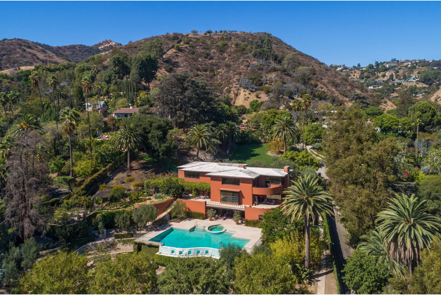 2000 La Brea Terrace | Hollywood Hills SOLD! $7,900,000 A Hollywood Hills Estate on 1.8 usable acres with city views. Iconic 1940's Moderne by C. Raimond Johnson AIA. First time on the market in 25 years, this rare and unique Mansion was built in 1941 with a vision of design rarely seen today. Gated community affords seclusion, yet moments from major destinations of the city. Large motor court, 2 story entry with unique curved wood and glass staircase. Walls of glass looking out to city views and lush landscaped grounds with resort sized pool. A true one of a kind opportunity!