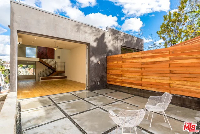 3251 Descanso Dr | Silver Lake SOLD! $1,300,000 (Rep’d Buyer & Seller) Sold Off-Market Modern architectural loft in the heart of Silver Lake with city and Sunset Blvd views. Clever design and meticulous craftsmanship compose this 3 bed 2.5 bath multi-level townhome. The living room with soaring ceilings and tall 3 panel sliders lead to the generous private patio and rear yard, offering the ultimate California indoor/outdoor lifestyle. The bright modern eat in kitchen comes with Bosch, Fischer & Paykel appliances and a custom bar area. Lighting by Artemide and Tom Dixon. Additional amenities include video intercom security system, 2 car direct garage w/ entry, 5 zone heating and air, polished concrete and wide plank white oak flooring. Designed by Green City Building, completed in 2017.