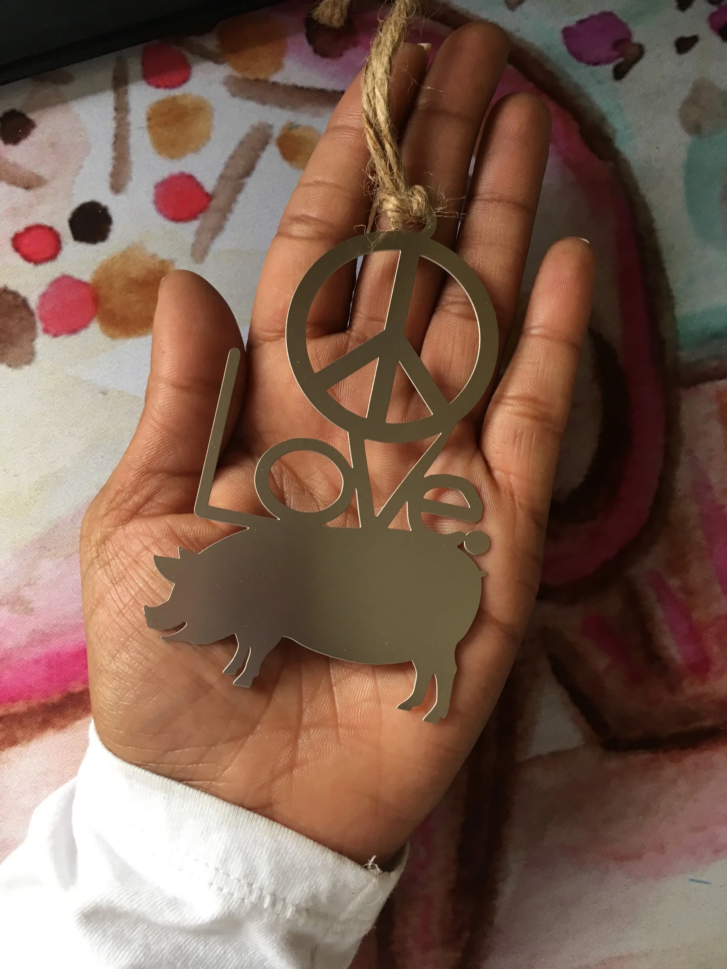Large Symbols Trinket in Hand.jpg