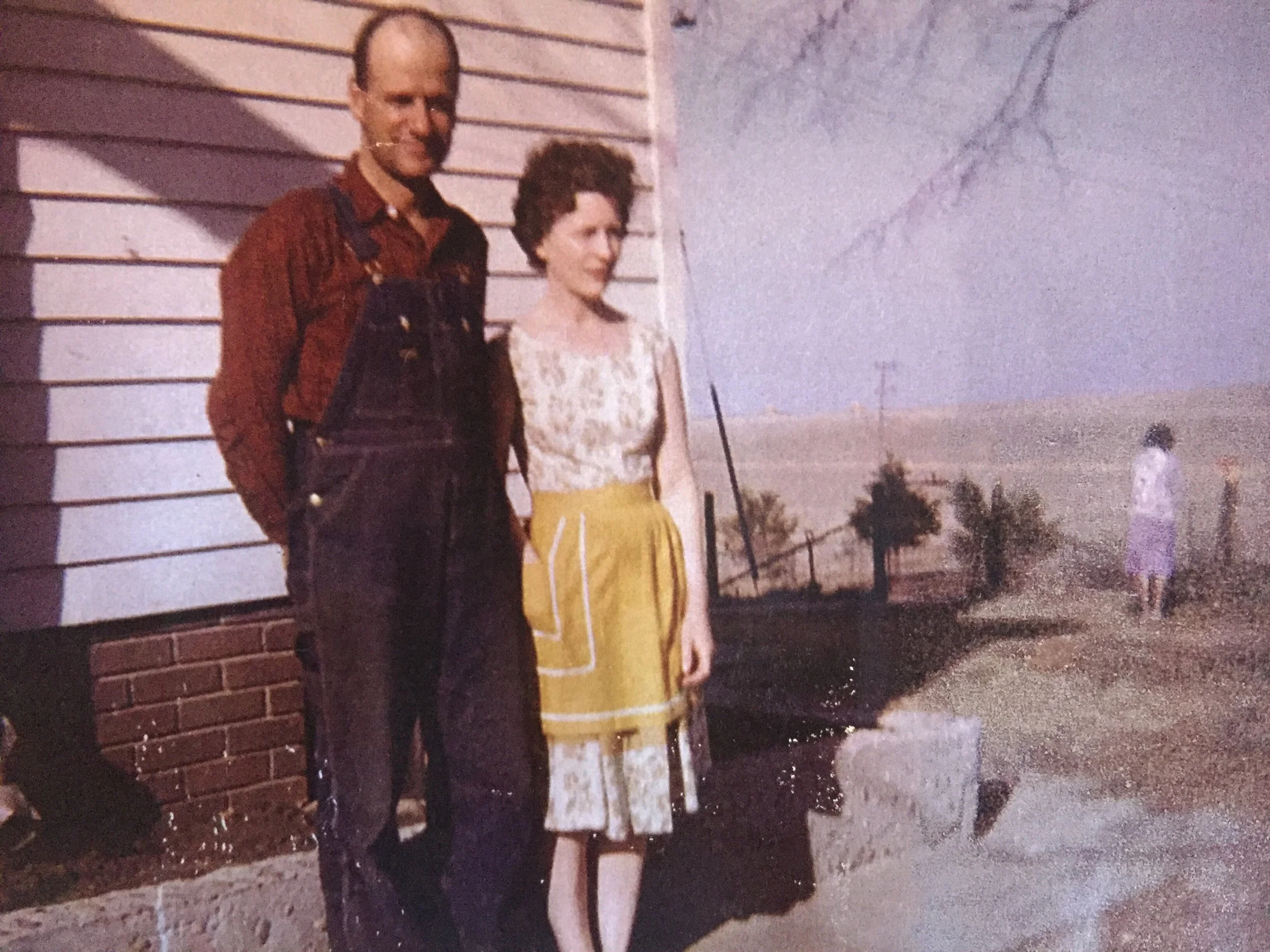 A young Marcella with her husband on the farm.