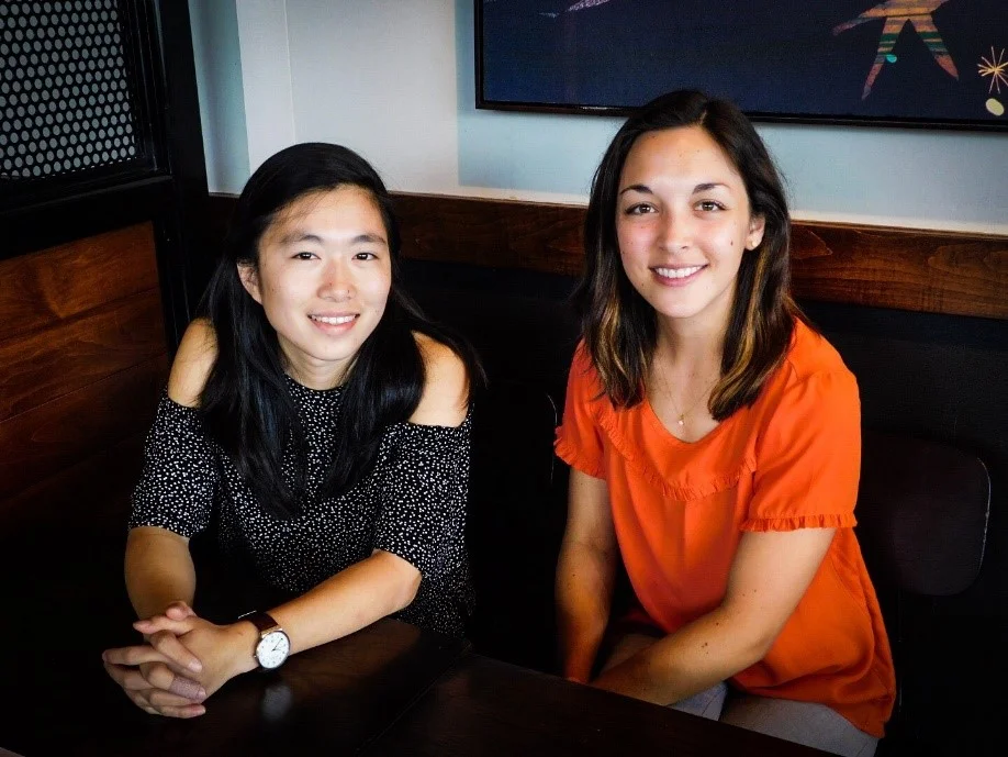 Katie Arnold (right) with her JP teammate, Constance Siu (left), Resource Development Associate