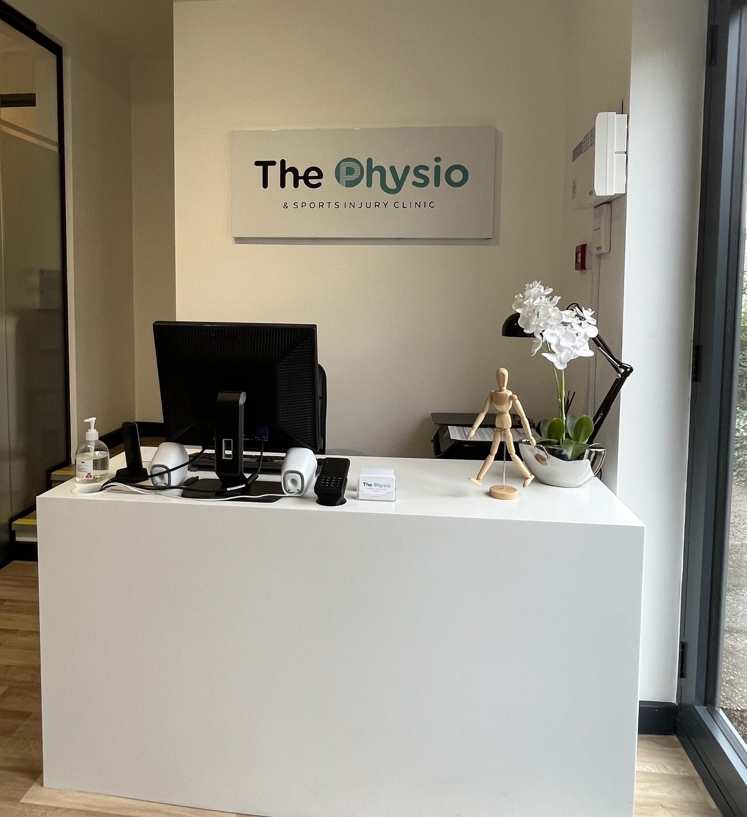 The Physio and Sports Injury Clinic reception desk.jpg