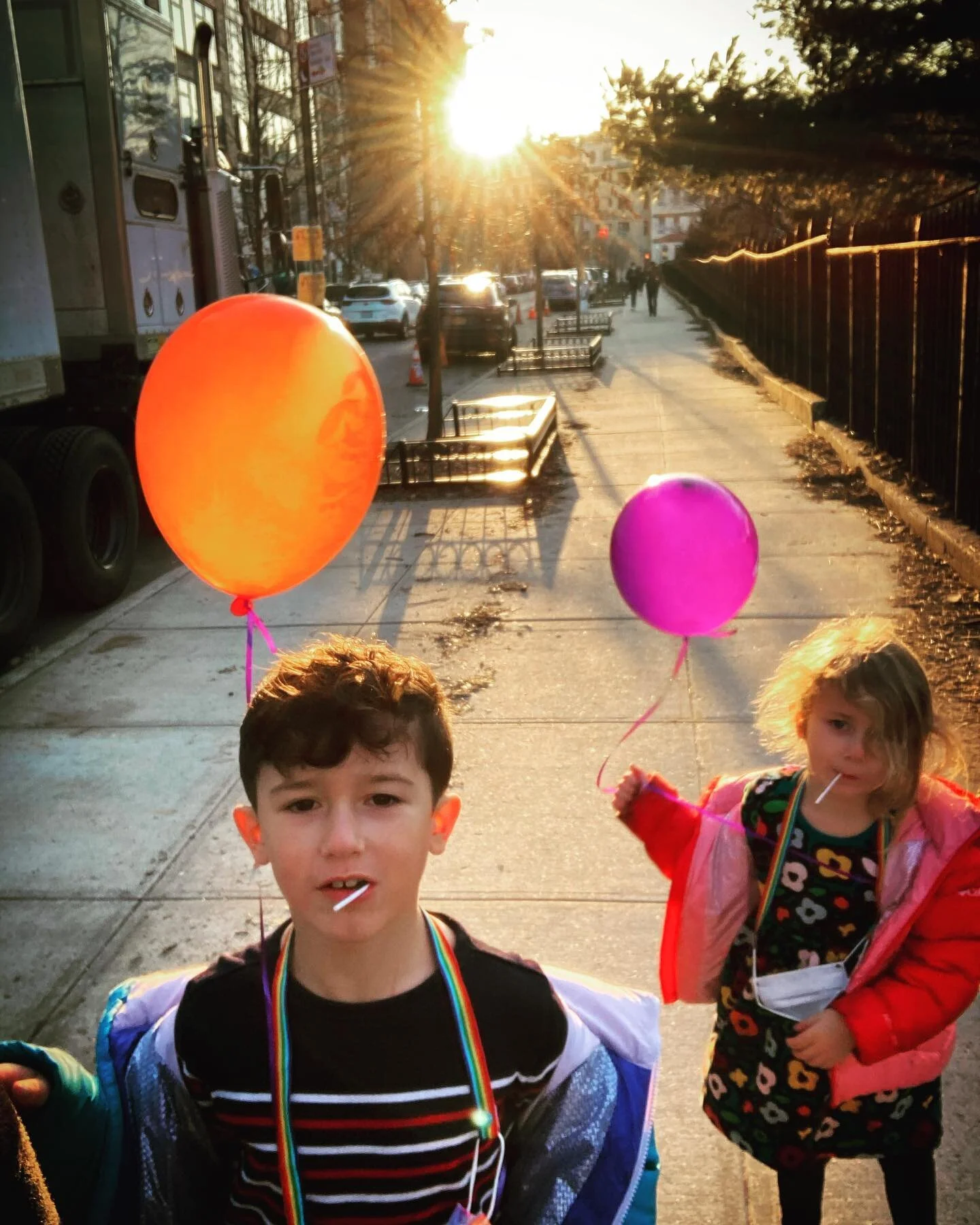 Haircut, balloons, lollipops, sunset.