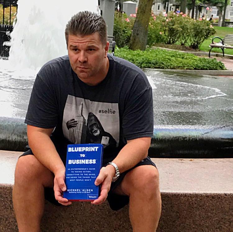 mike and book sitting.jpg