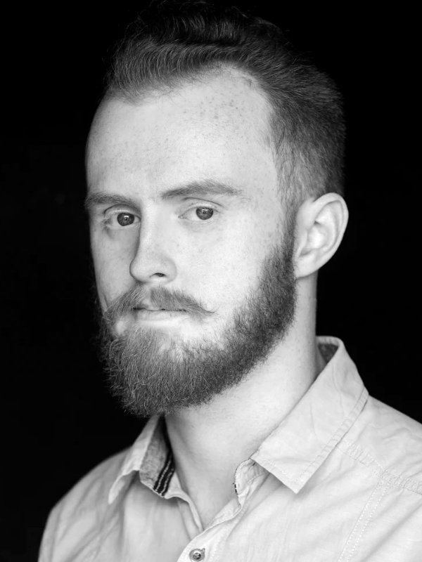 Tom bio pic BW.png