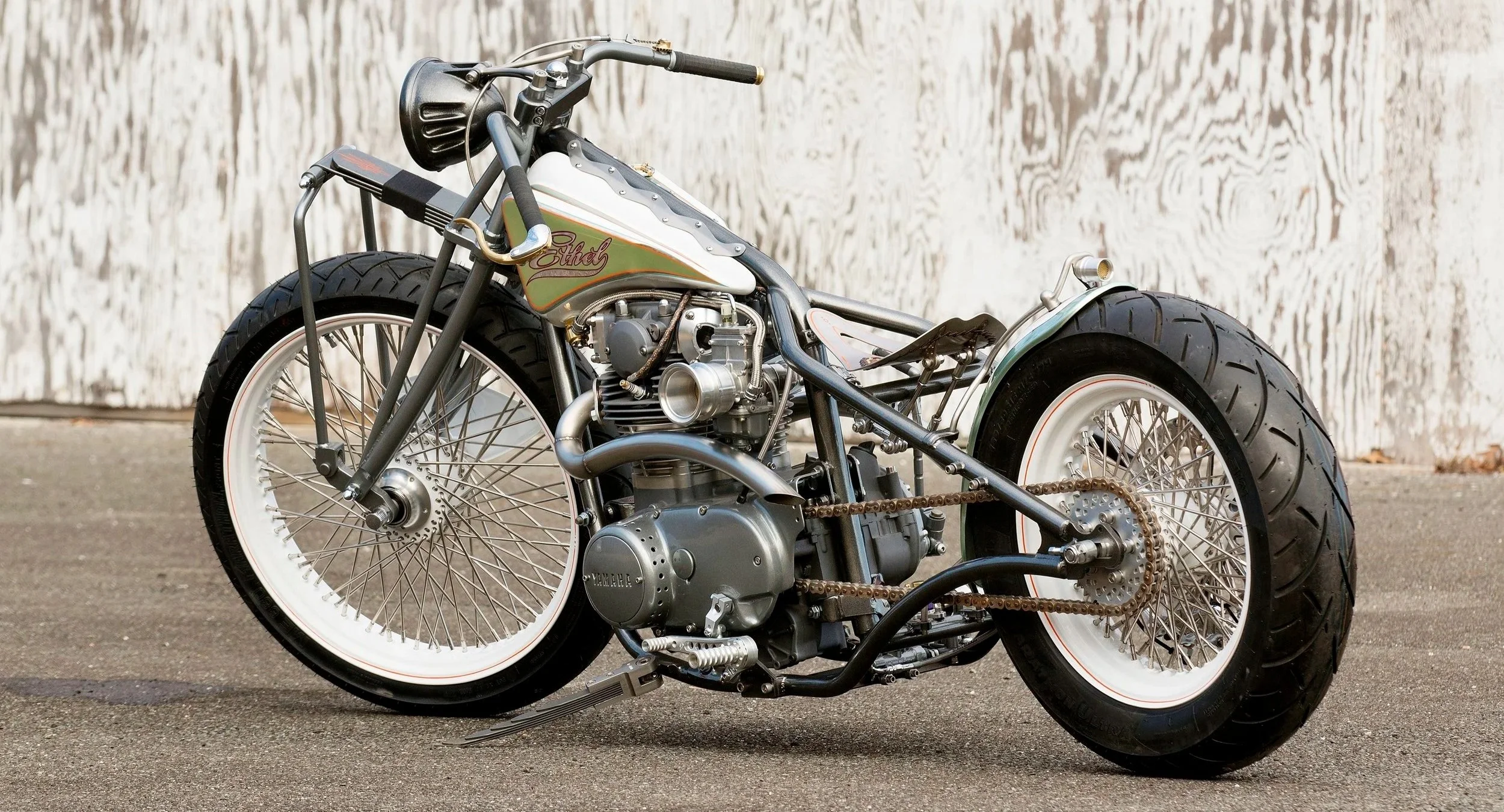 Custom Yamaha motorcycle named Ethel, featuring a vintage-style frame, exposed engine, and hand-built metal components.