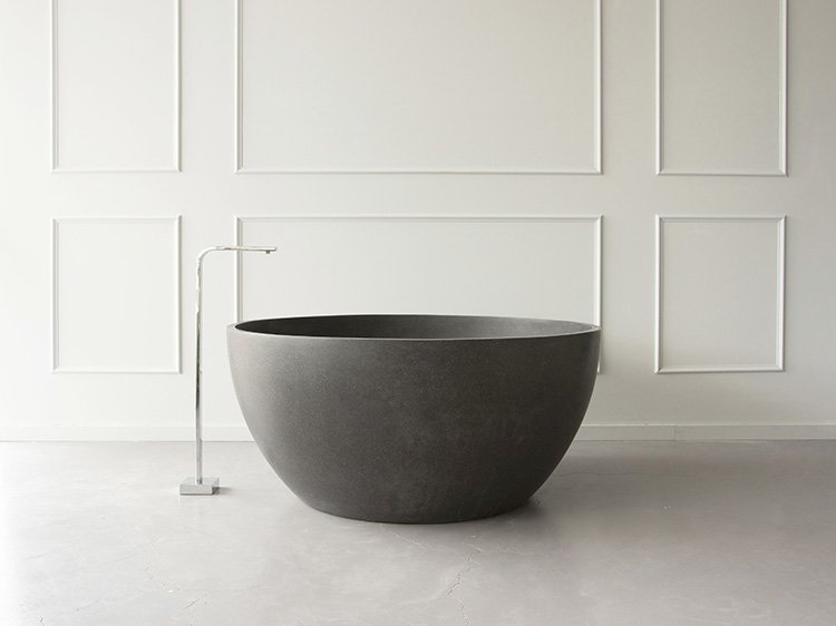 In situ view of our Raphael 1200mm Stone Composite Bath in dark grey colour