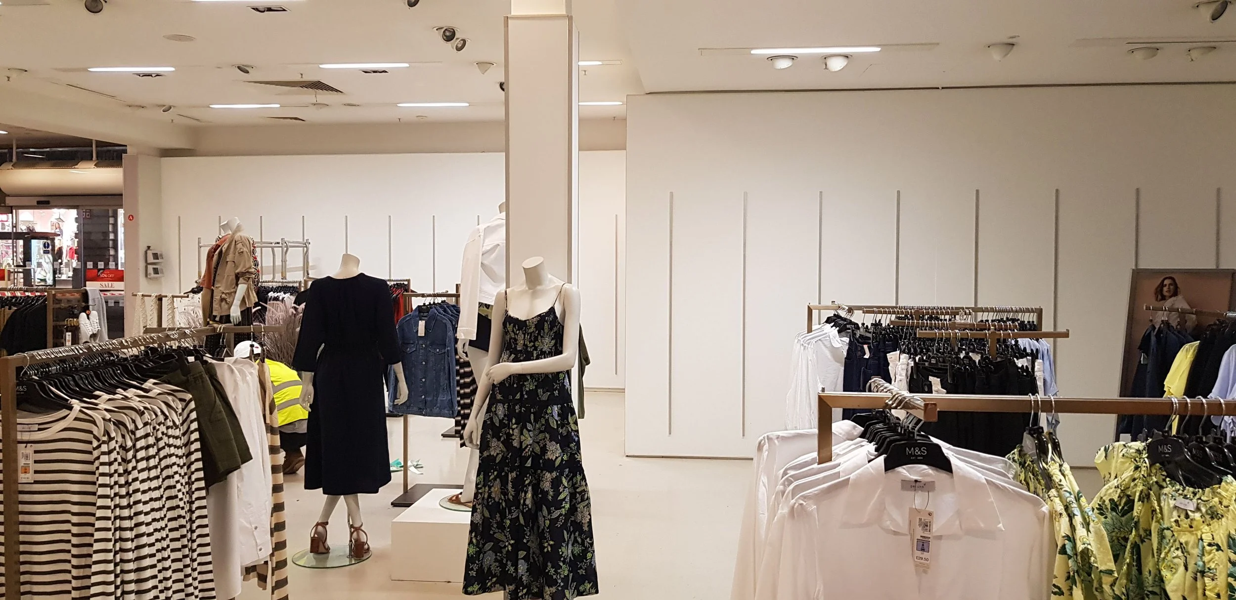 Vinyl wrapped interior walls at clothing retailer