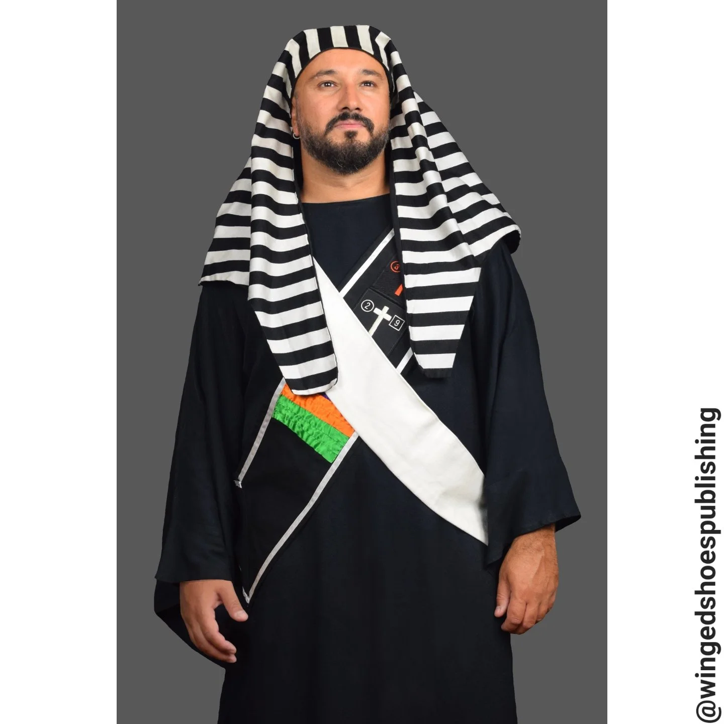 This is the Golden Dawn Outer Order regalia. Since I am frequently asked where I got my teachings, at least the ones pertaining to "The Magus," the answer is in this pic. See, unlike many people who claim to be Spiritual authorities on soci