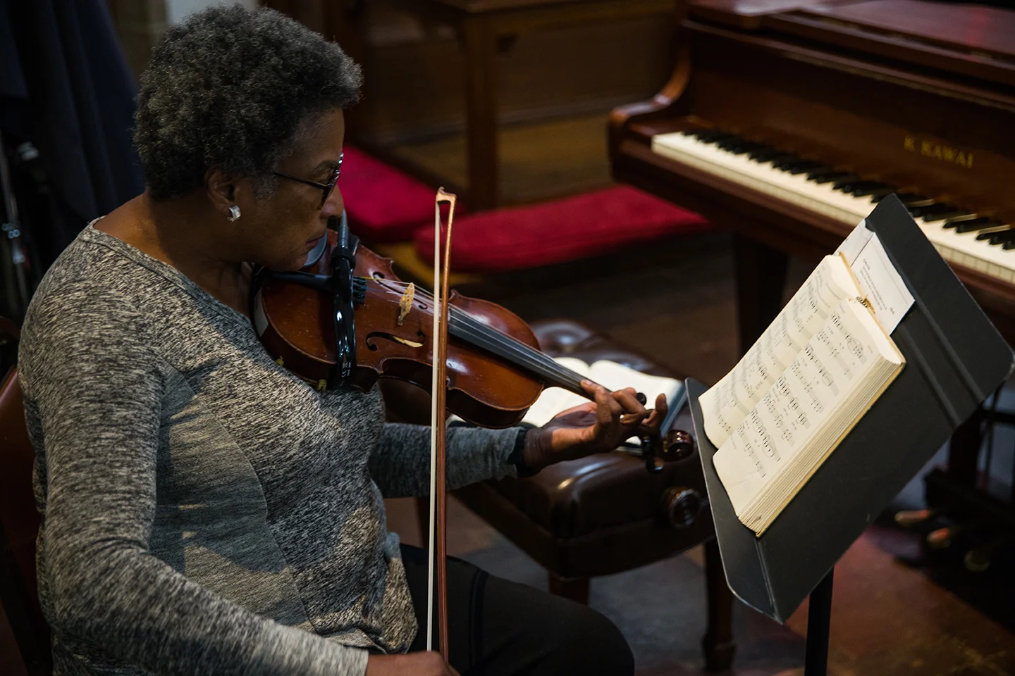 A violinist plays the prelude as worship begins at mckendree umc in Washington d.C.