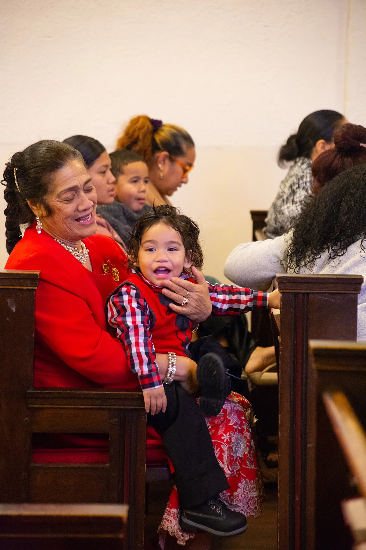 Grandmother holds her grandchild