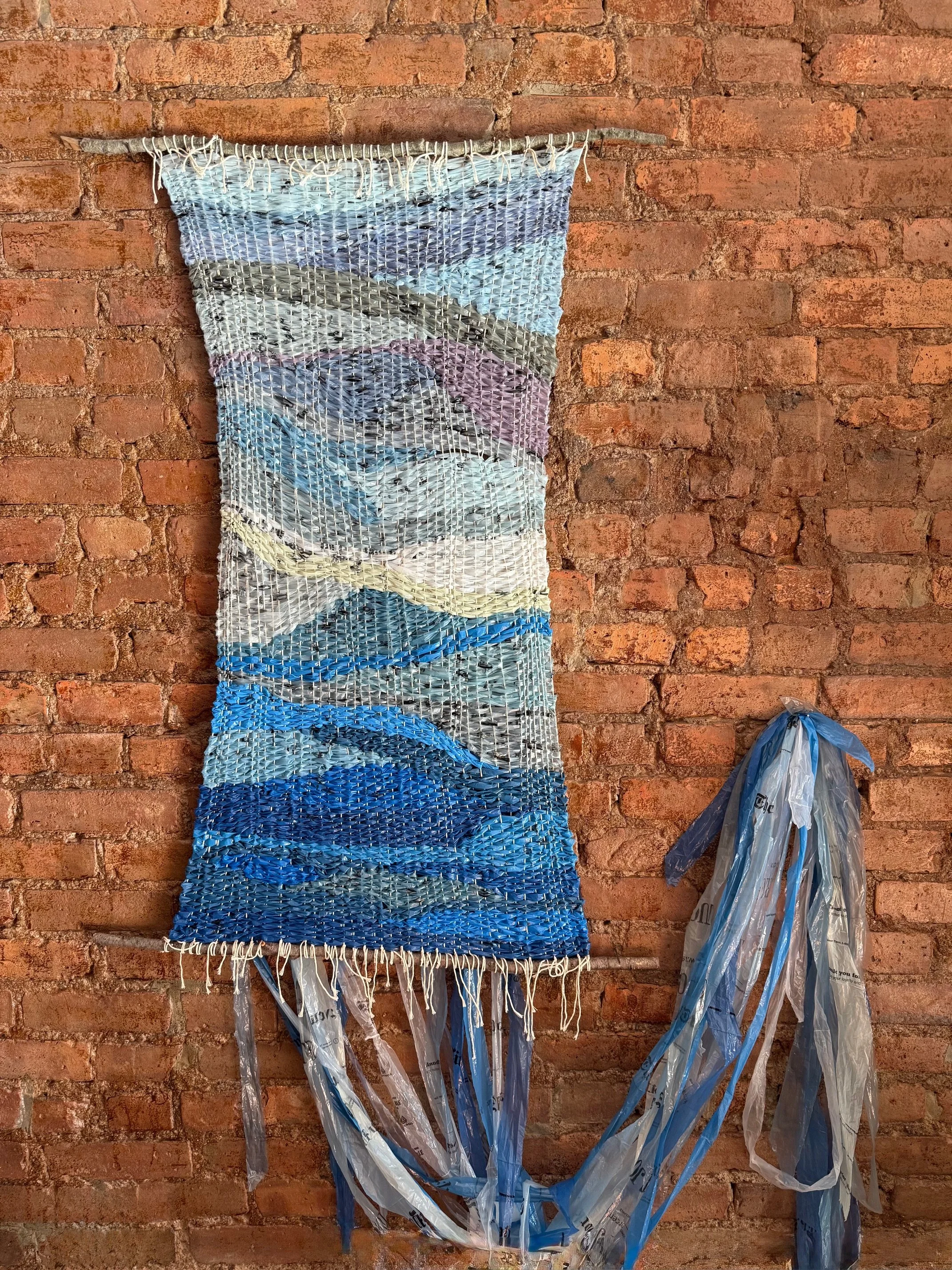 Journal of the Times / 20" x 40" / Upcycled New York Times and Wall Street Journal Sleeves, Organic Unbleached Cotton Twine, and Fallen Sticks Collected from the Woods.