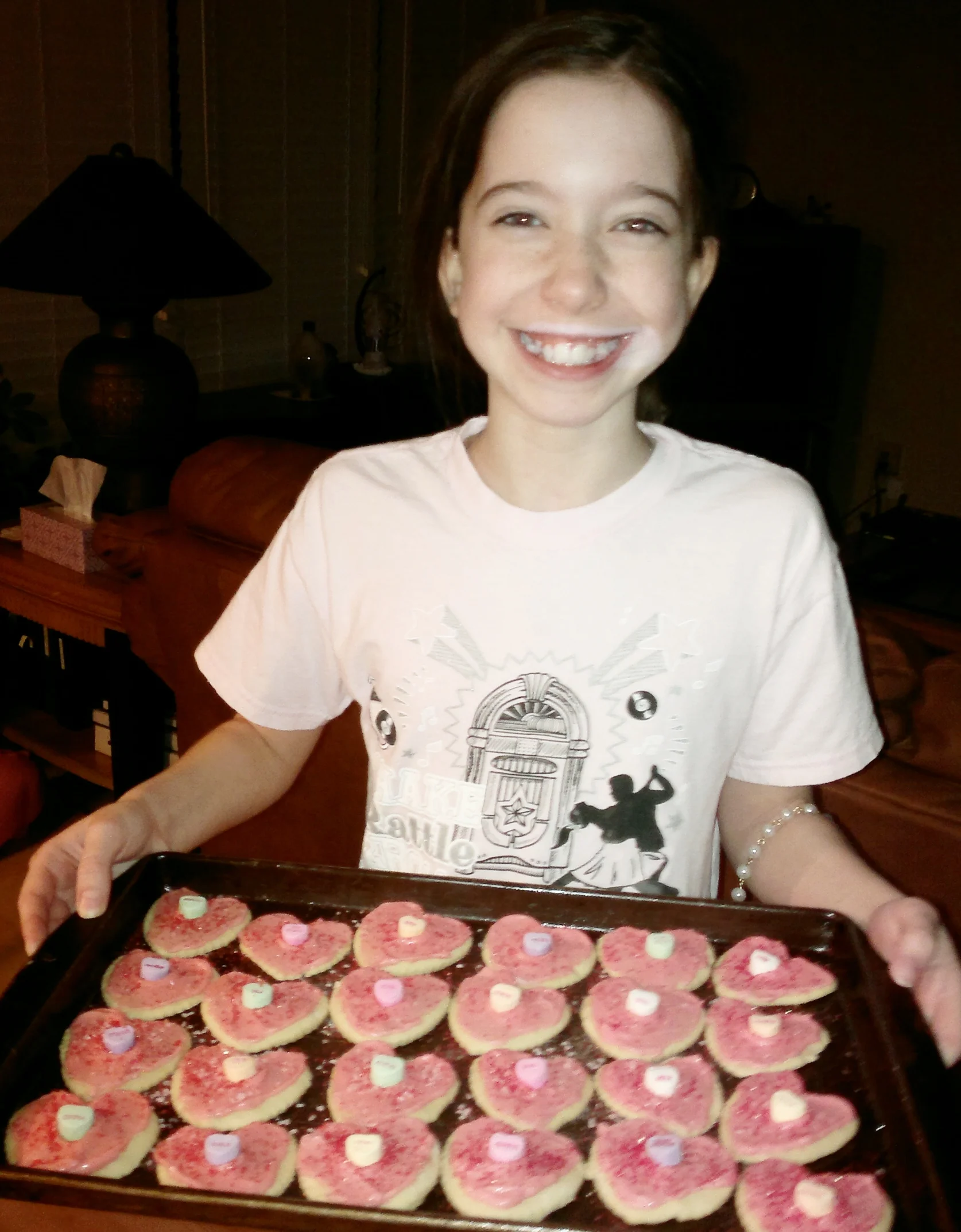 Bella with cookies she helped make for the staff at the nursing home - Feb 2014