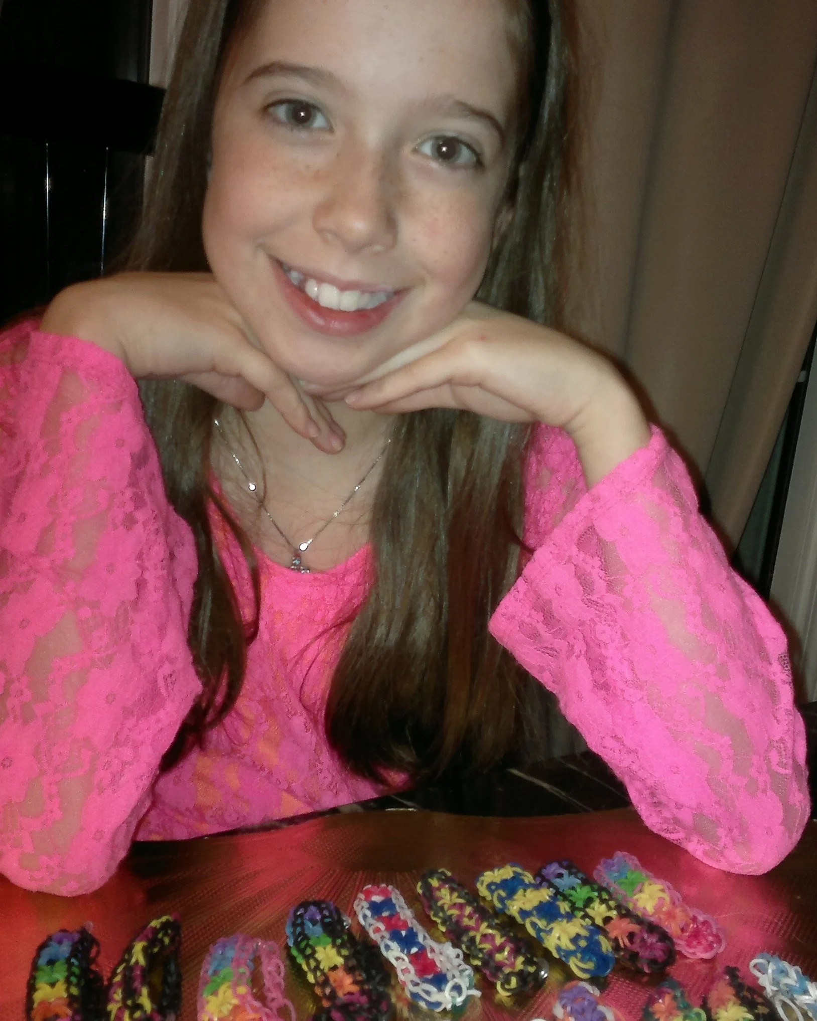 Bella with loom bands she made to raise money for "Joe" - Dec 2013