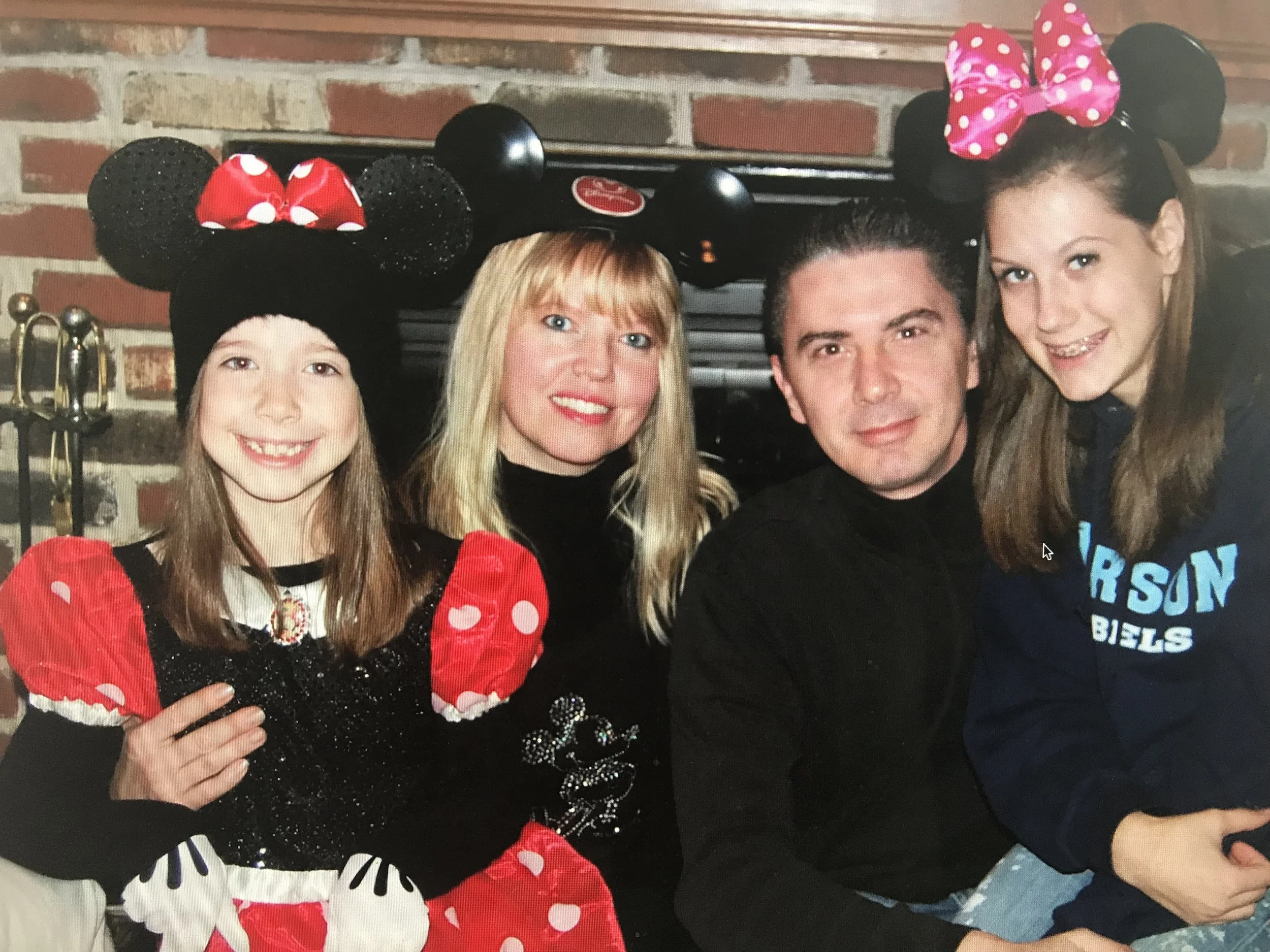 Bella, Brenda, Dorin and Julia wearing their “Mickey Mouse” ears
